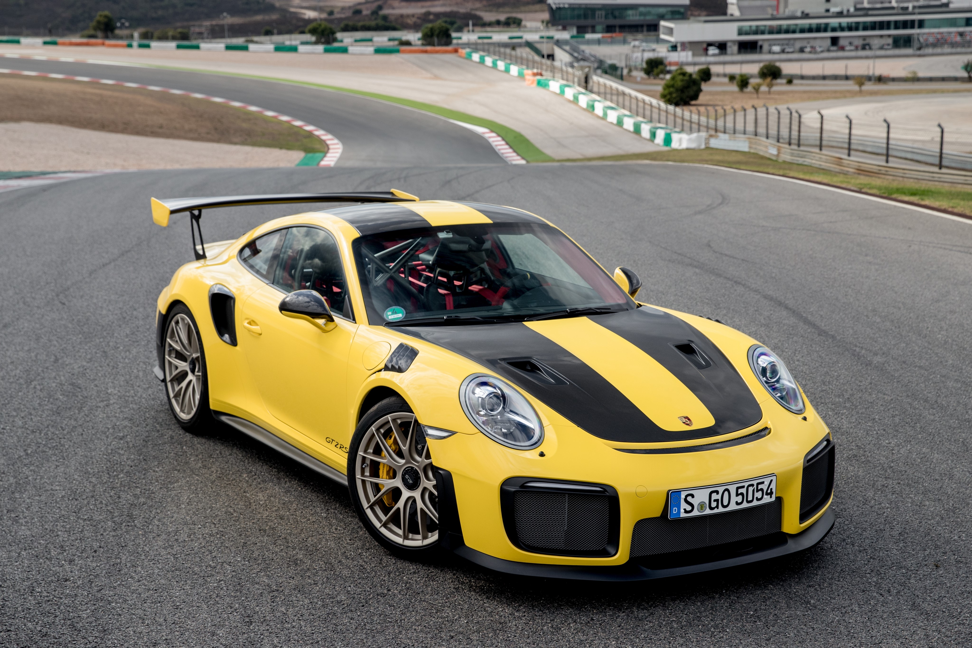 Yellow Porsche 911 GT2 RS on a Race Track HD Wallpaper