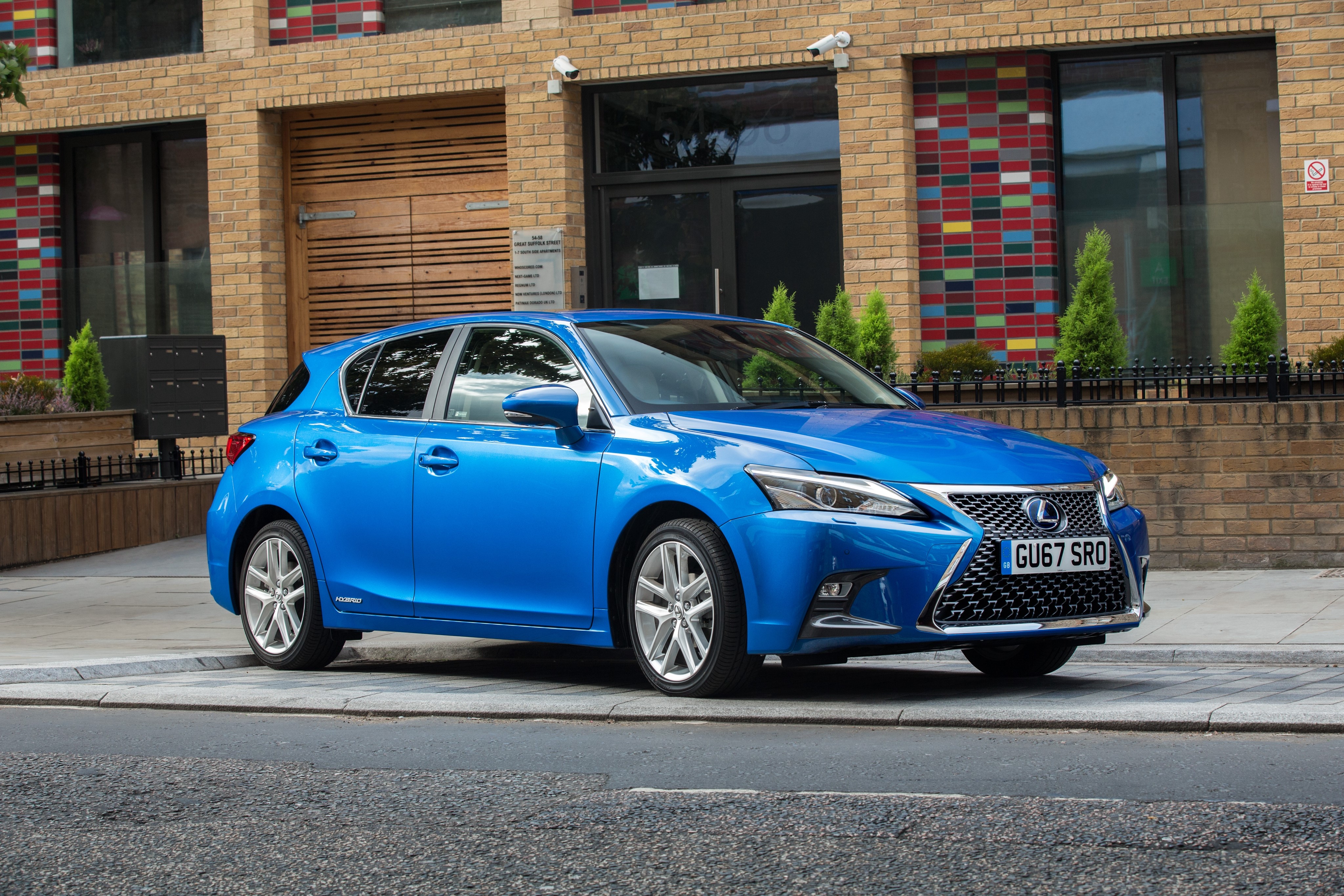 Blue 2017 Lexus CT 200h parked in front of a building HD Wallpaper