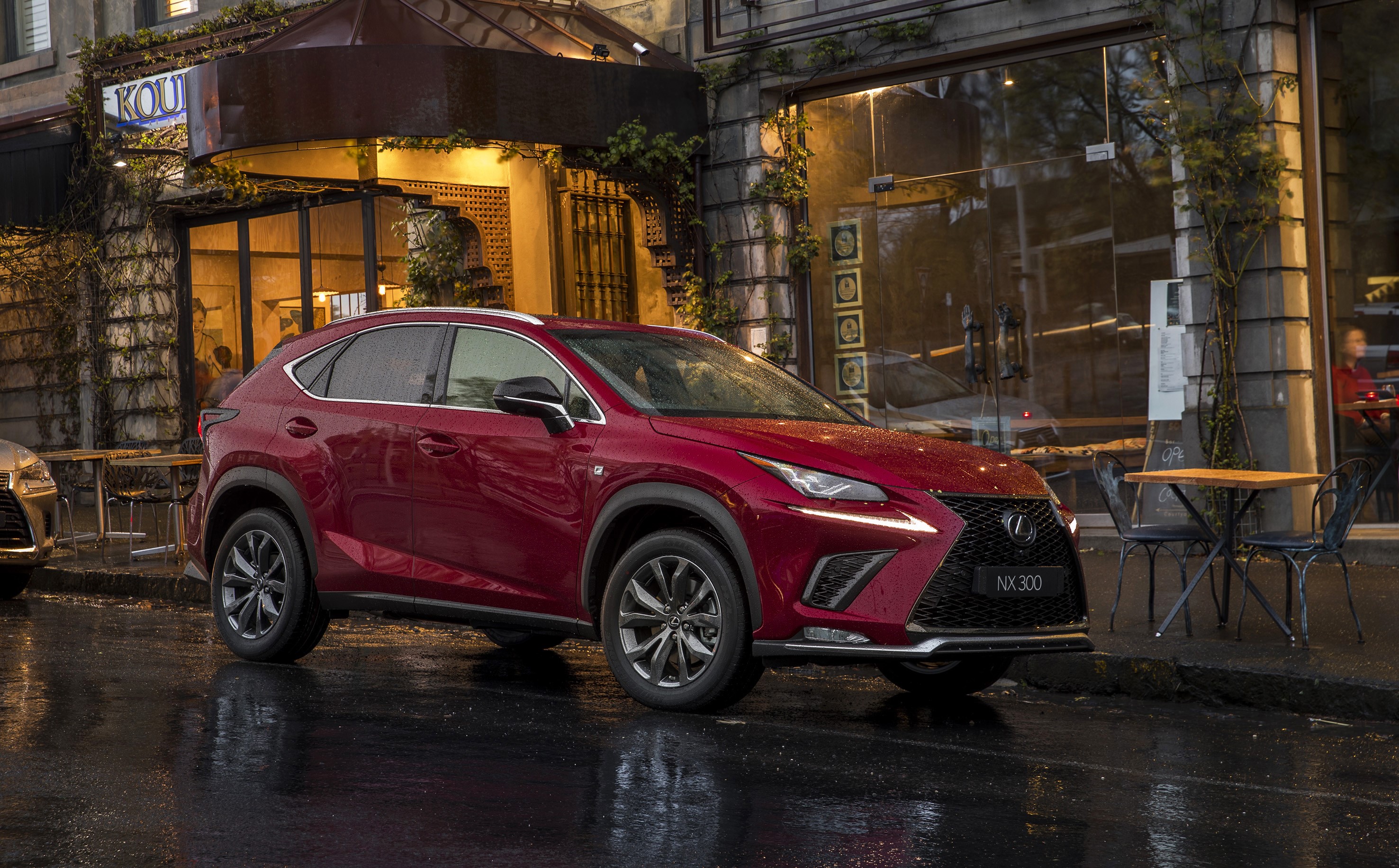 Red Lexus NX 300 F SPORT parked on a wet street HD Wallpaper