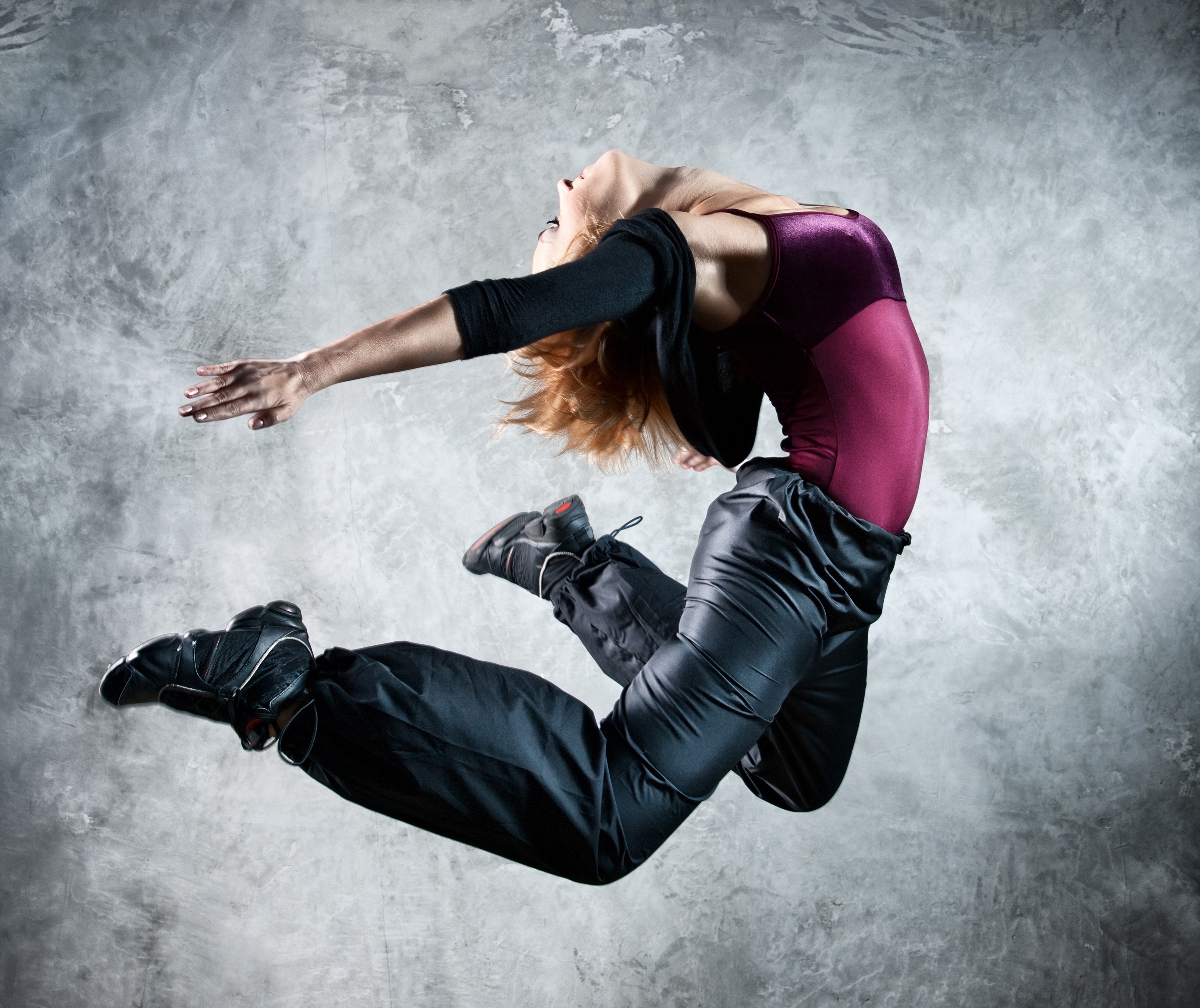Dancer in mid-air jump HD Wallpaper