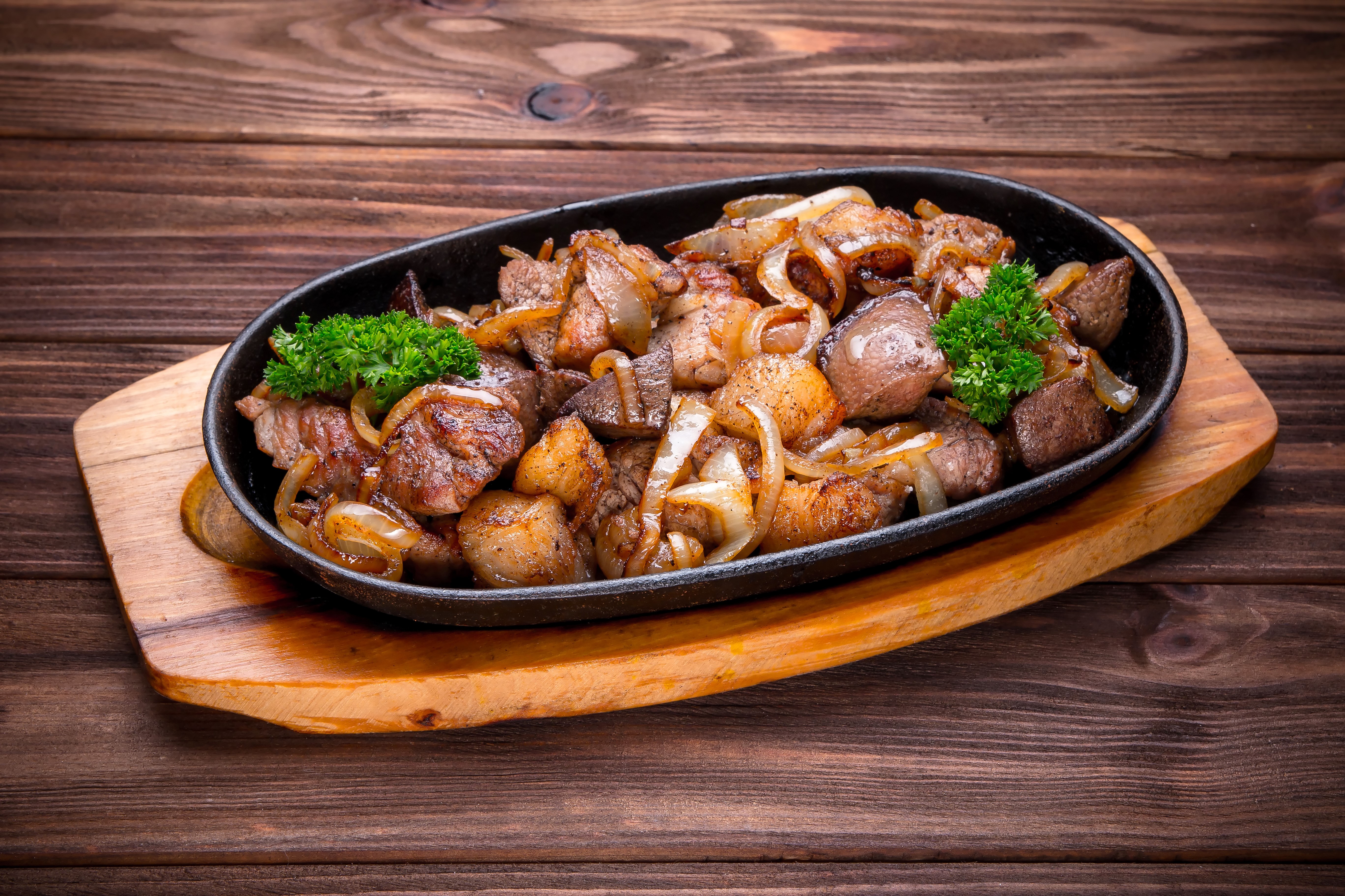 Grilled Meat and Onions on a Hot Plate HD Wallpaper