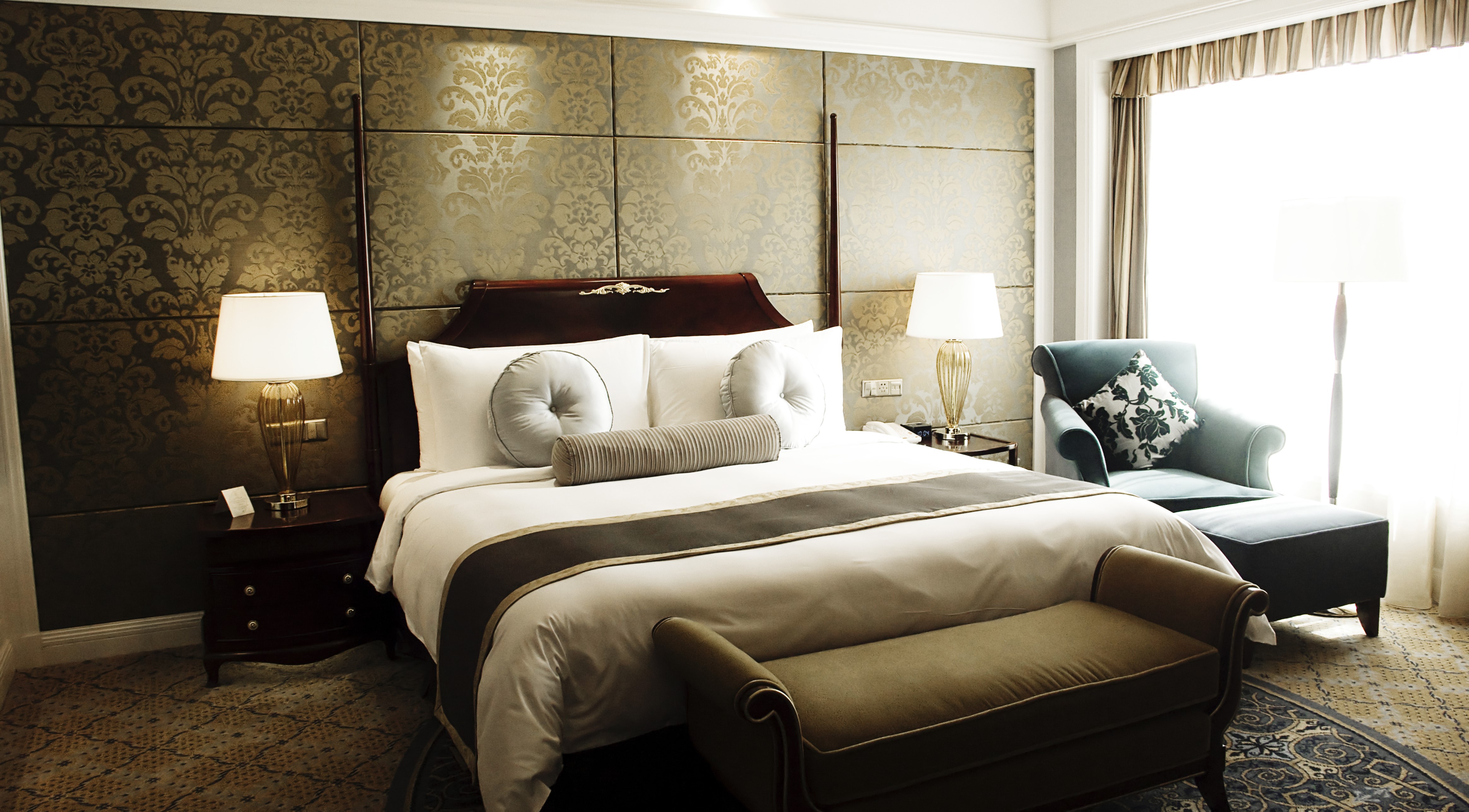 Luxury Bedroom with Bed, Lamp, and Armchair HD Wallpaper