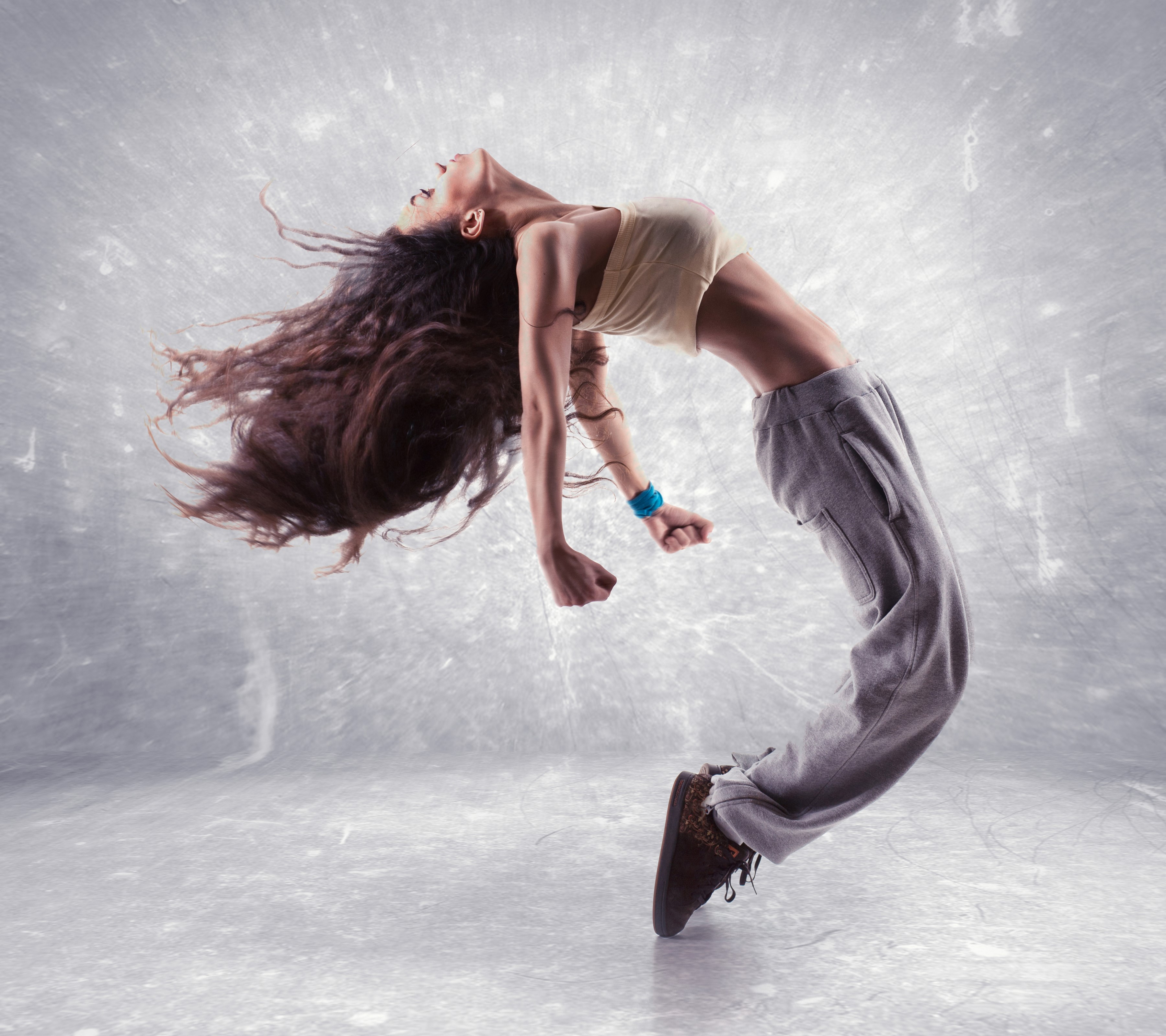 Woman with long brown hair dancing HD Wallpaper
