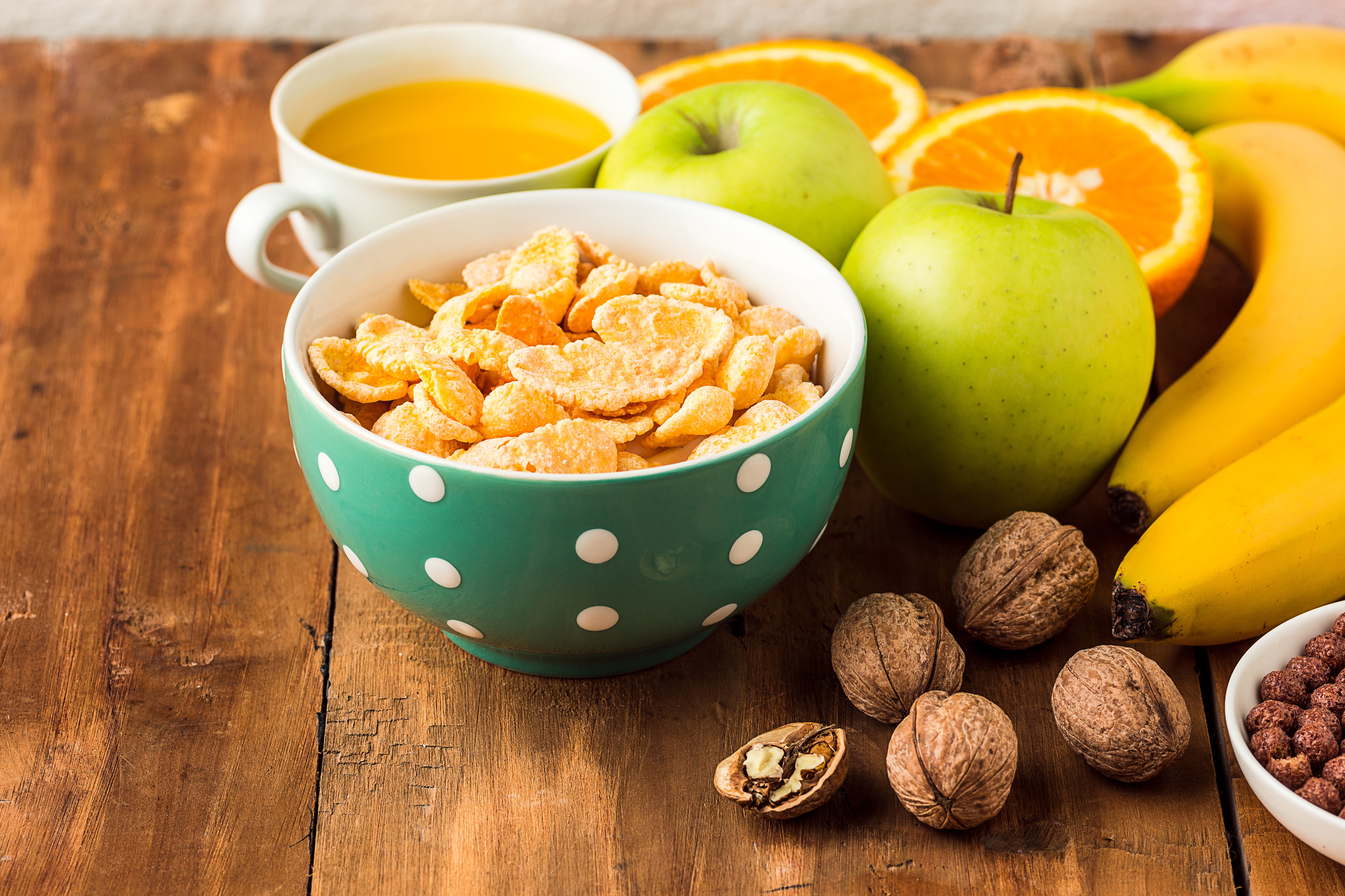 Breakfast with Corn Flakes, Fruit, Nuts, and Juice HD Wallpaper