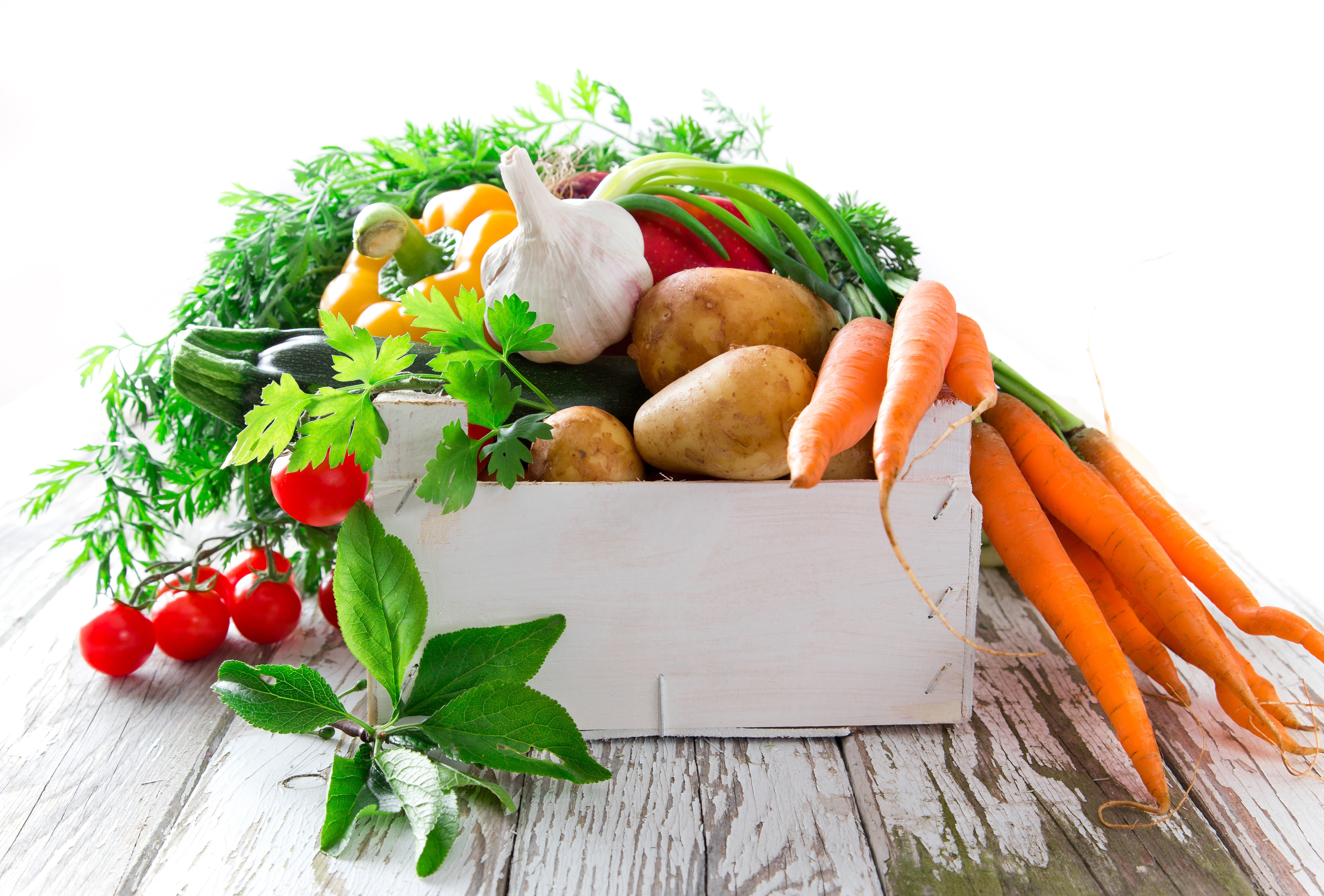 Vegetables in a wooden crate: Carrots, Potatoes, Garlic, Tomatoes, Peppers, Zucchini HD Wallpaper