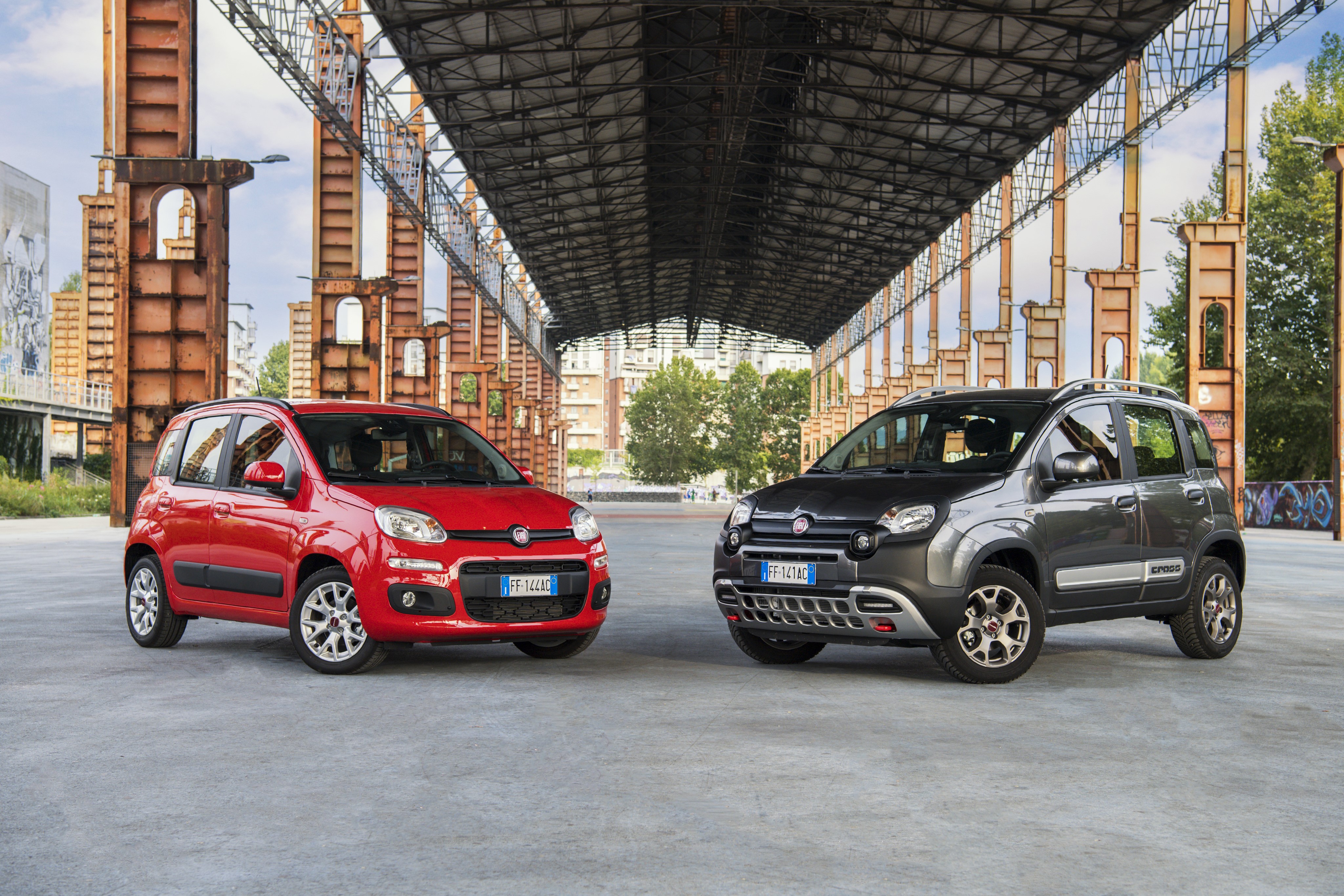 Two Fiat Panda cars in an industrial setting HD Wallpaper