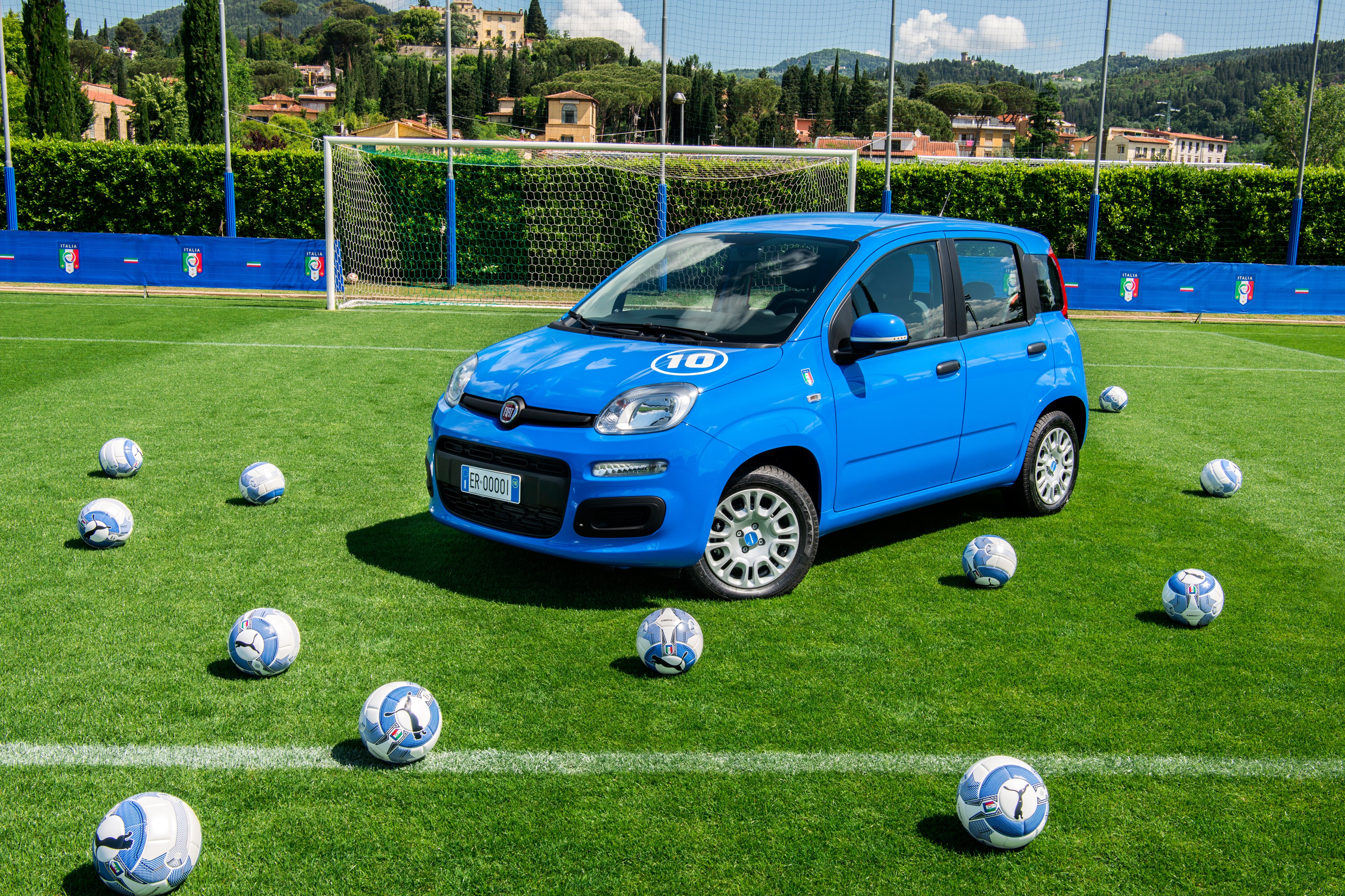 Fiat Panda 4x4 Pandazzurri on a soccer field HD Wallpaper