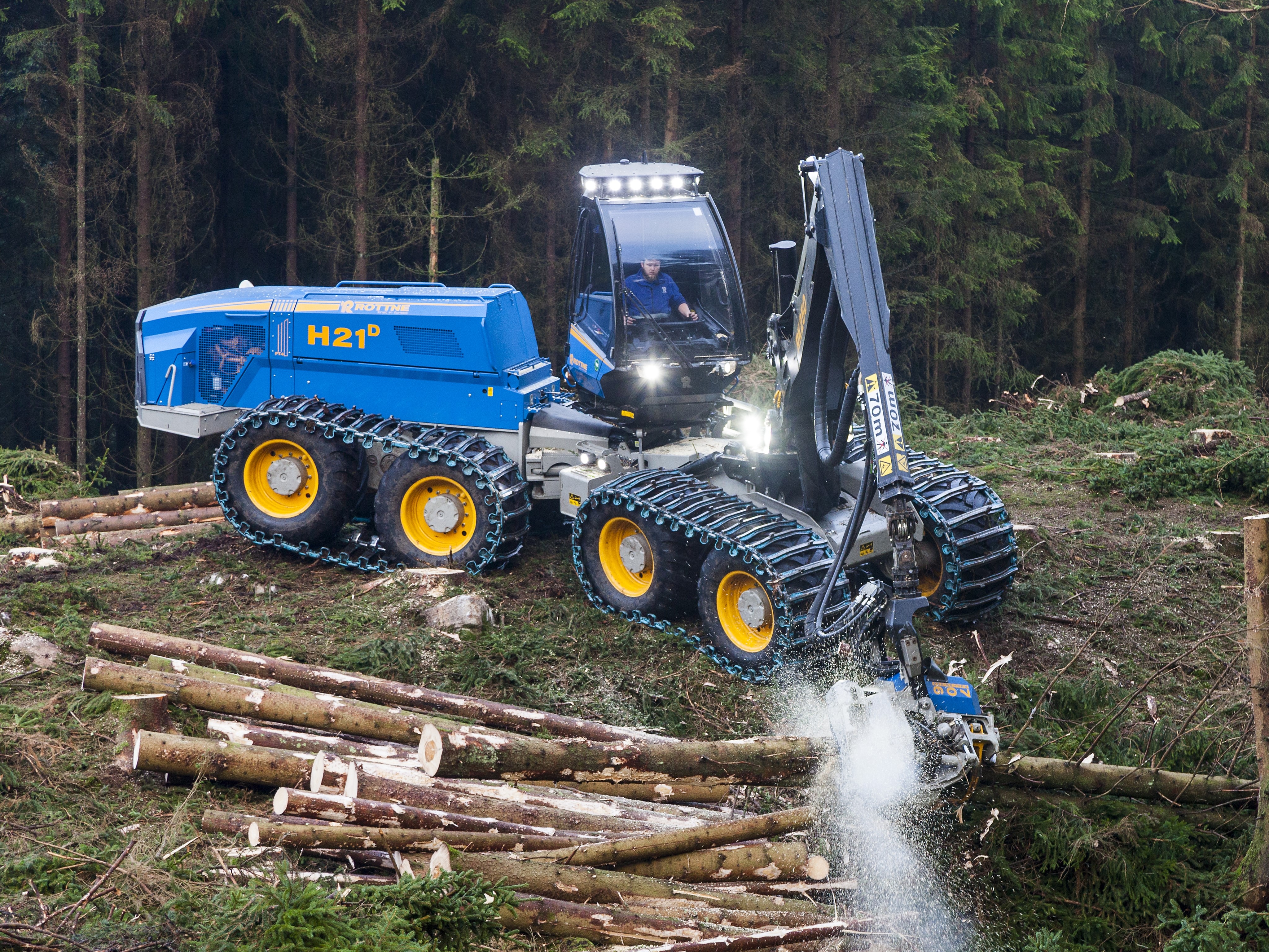 Rottne H21D Harvester cutting wood logs HD Wallpaper