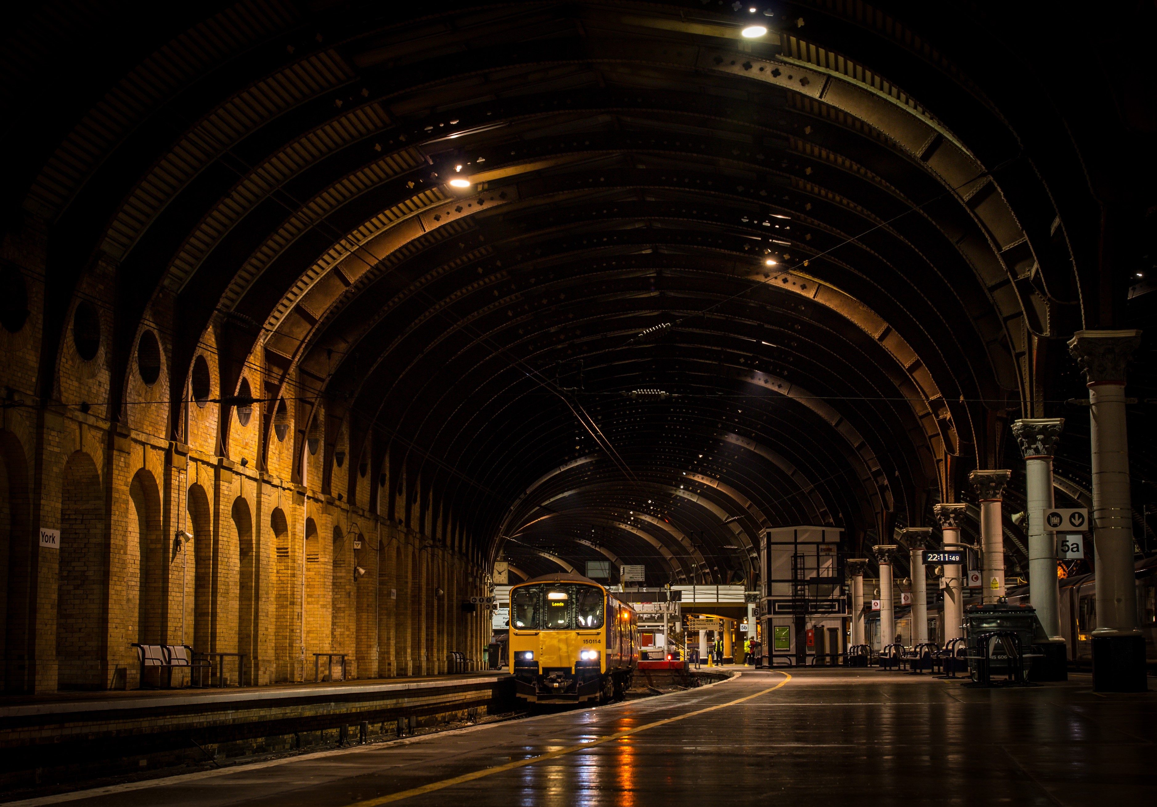 Train station tunnel at night in York, England HD Wallpaper
