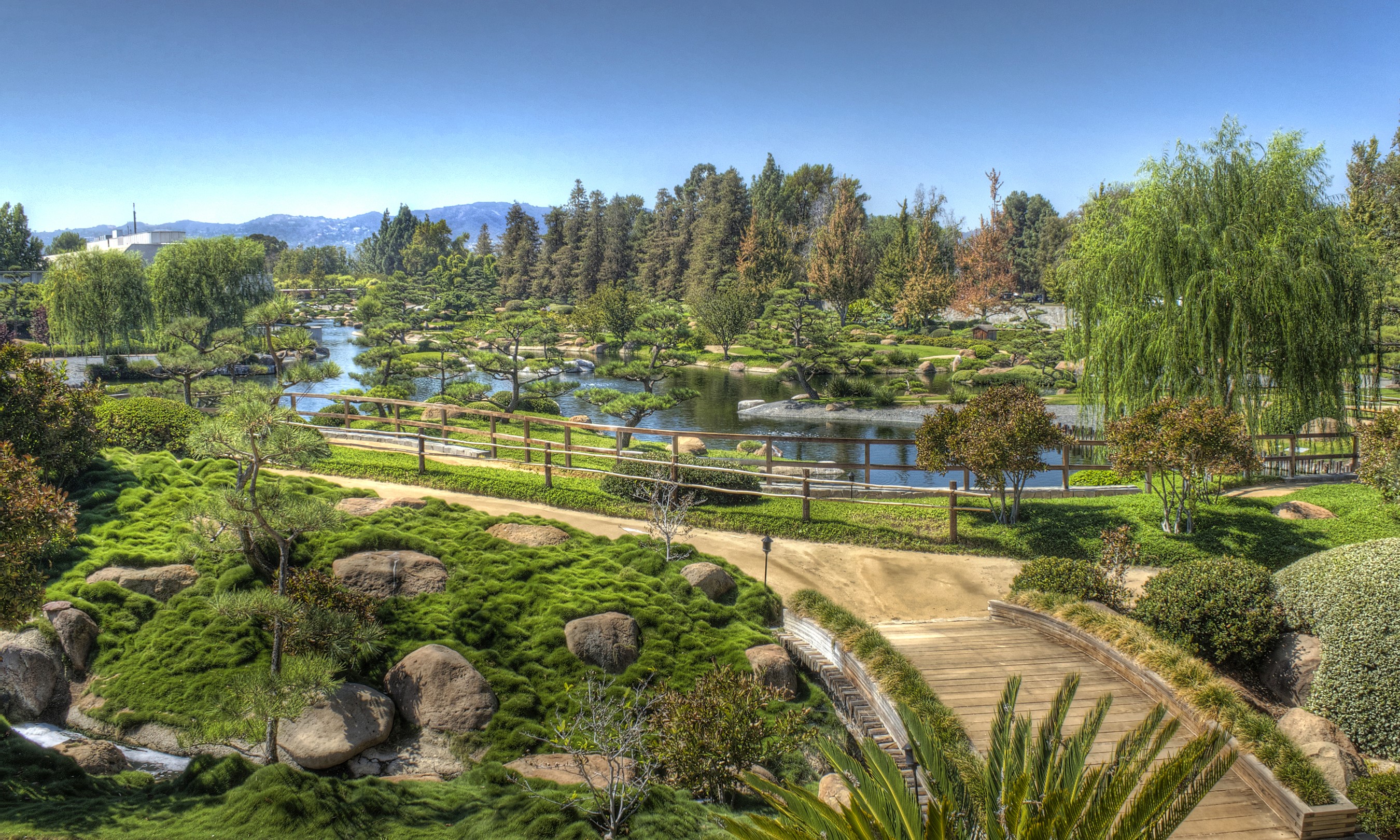 Japanese Garden with Pond, Bridge, and Mountains HD Wallpaper
