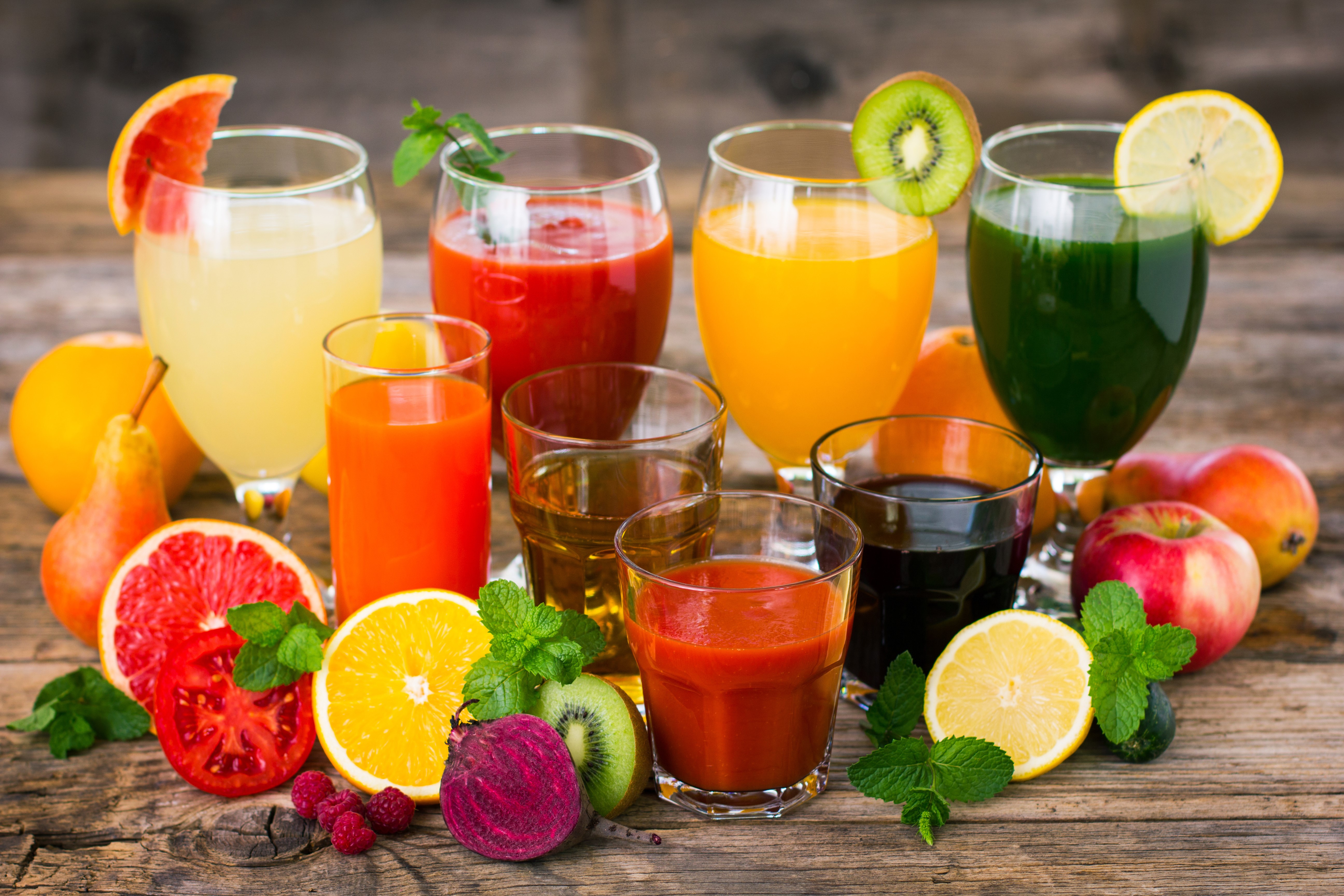 Assortment of Fresh Juices and Fruits HD Wallpaper