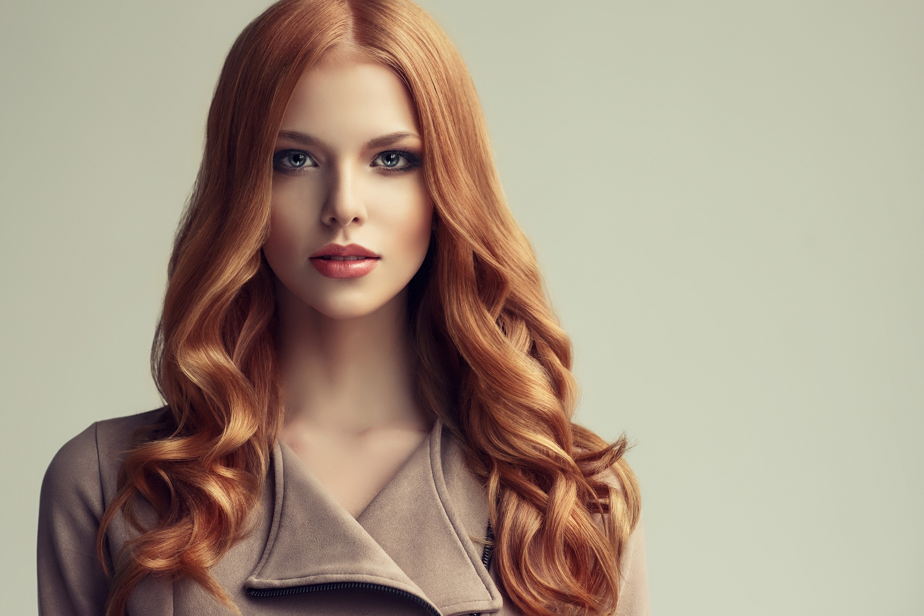 Redhead woman with wavy hair wearing a beige jacket HD Wallpaper