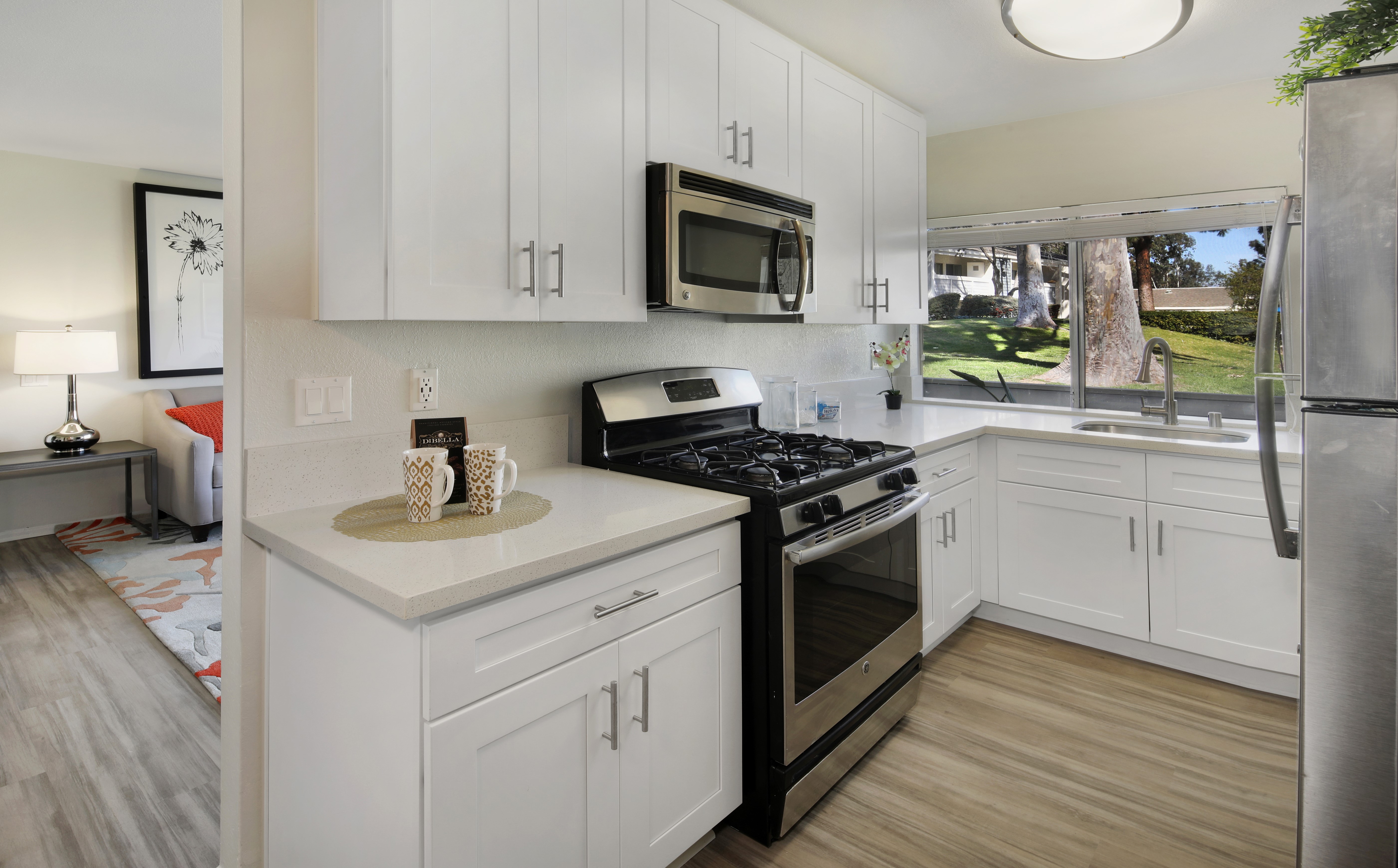 Modern Kitchen with Stainless Steel Appliances HD Wallpaper