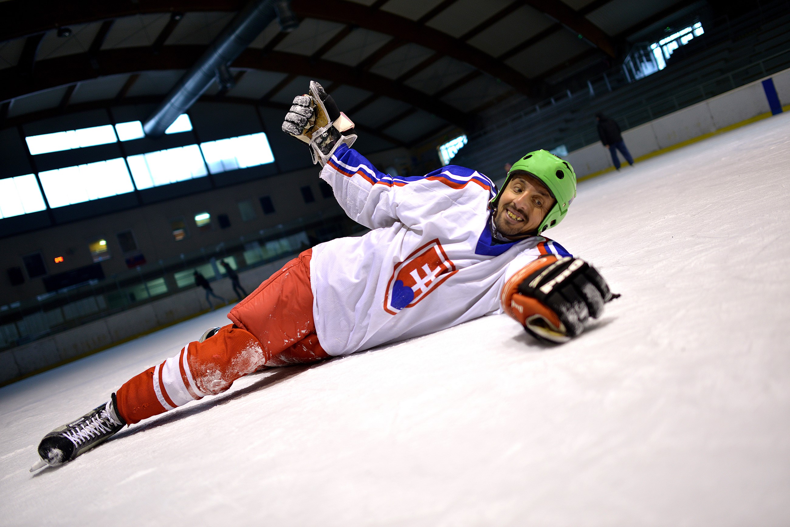 Man in Slovakian Hockey Uniform on Ice HD Wallpaper