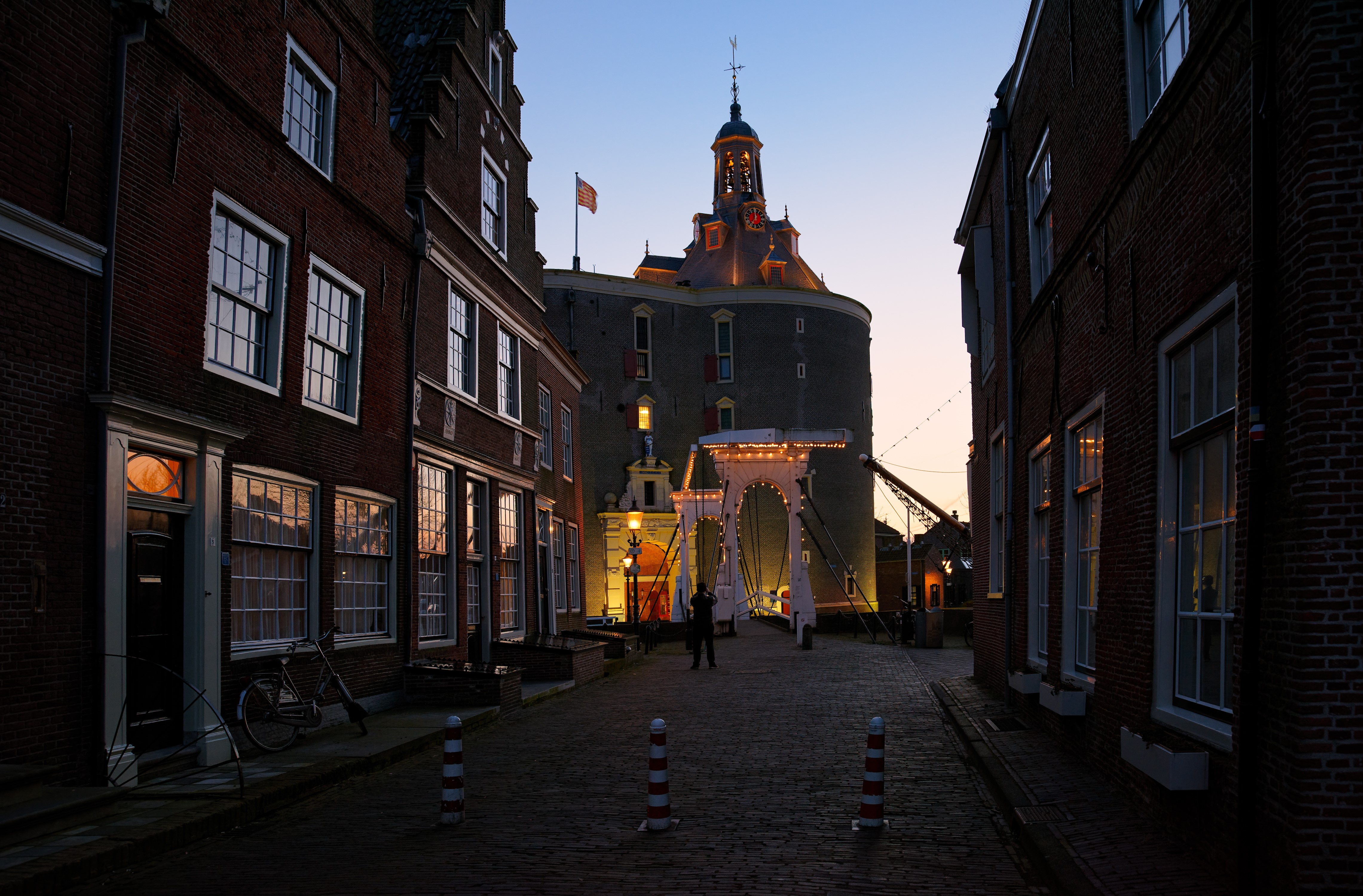 Enkhuizen Netherlands Street with Bridge and Tower at Dusk HD Wallpaper