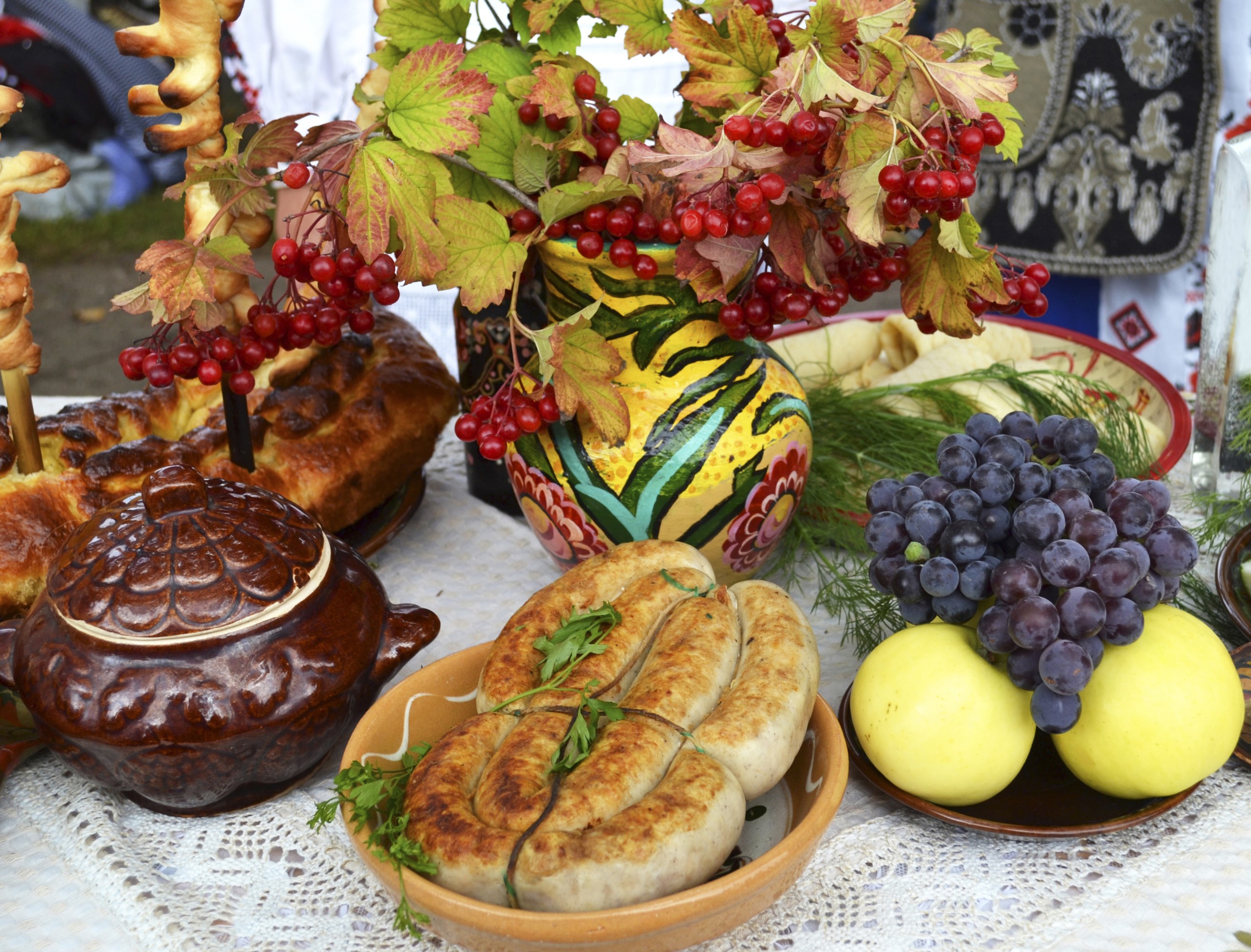 Sausages, Grapes, Apples, and Pastries on a Table HD Wallpaper