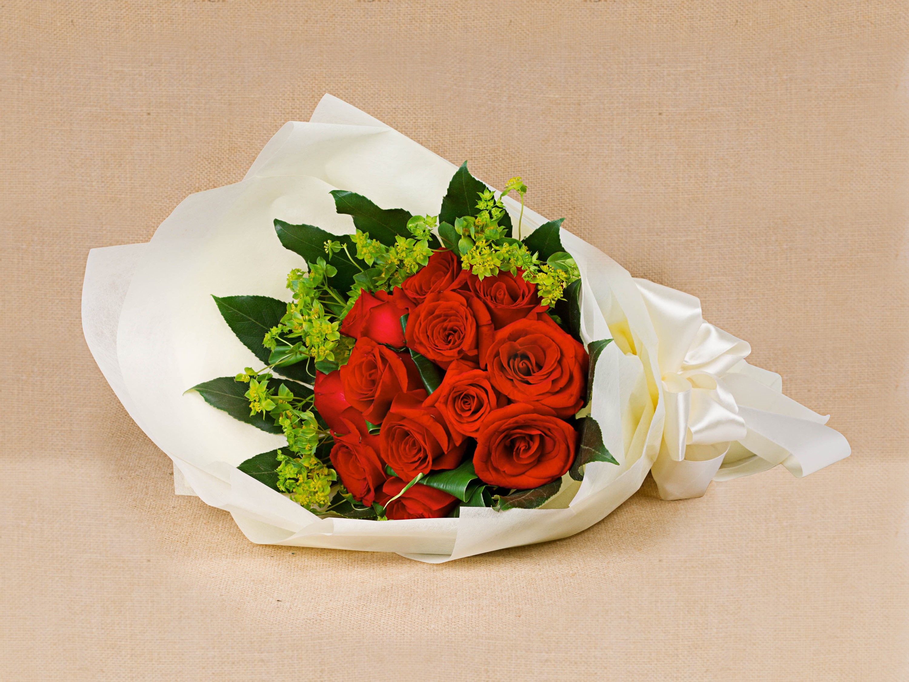 Bouquet of red roses with green accents HD Wallpaper