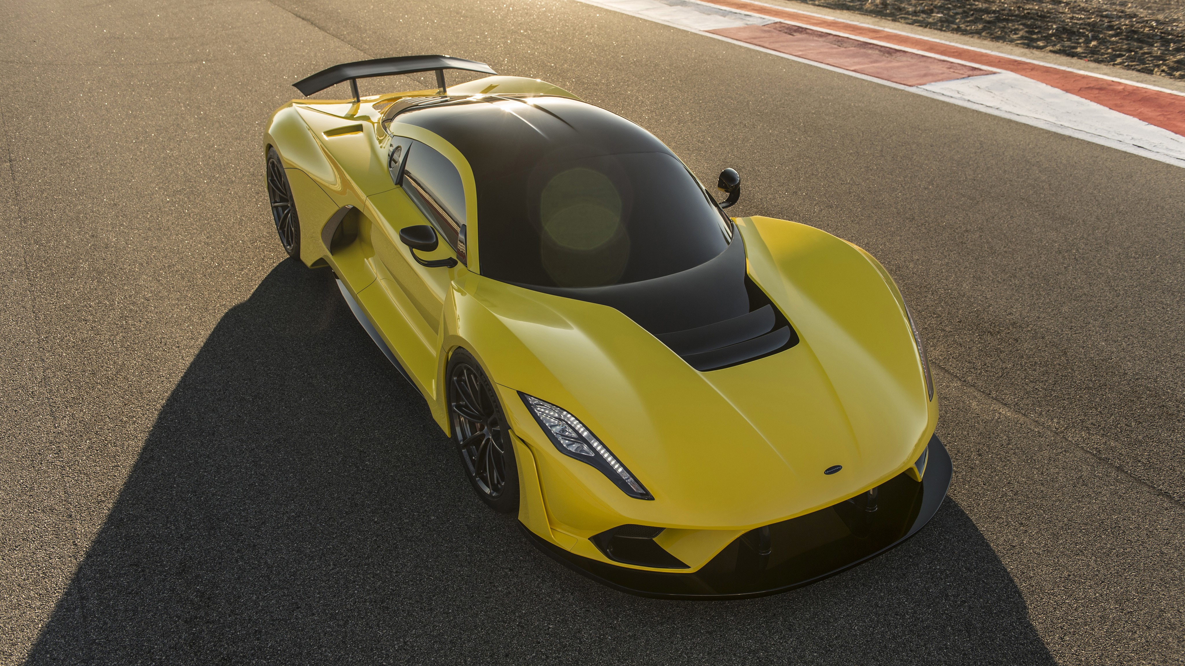 Yellow Hennessey Venom F5 on a Racetrack HD Wallpaper