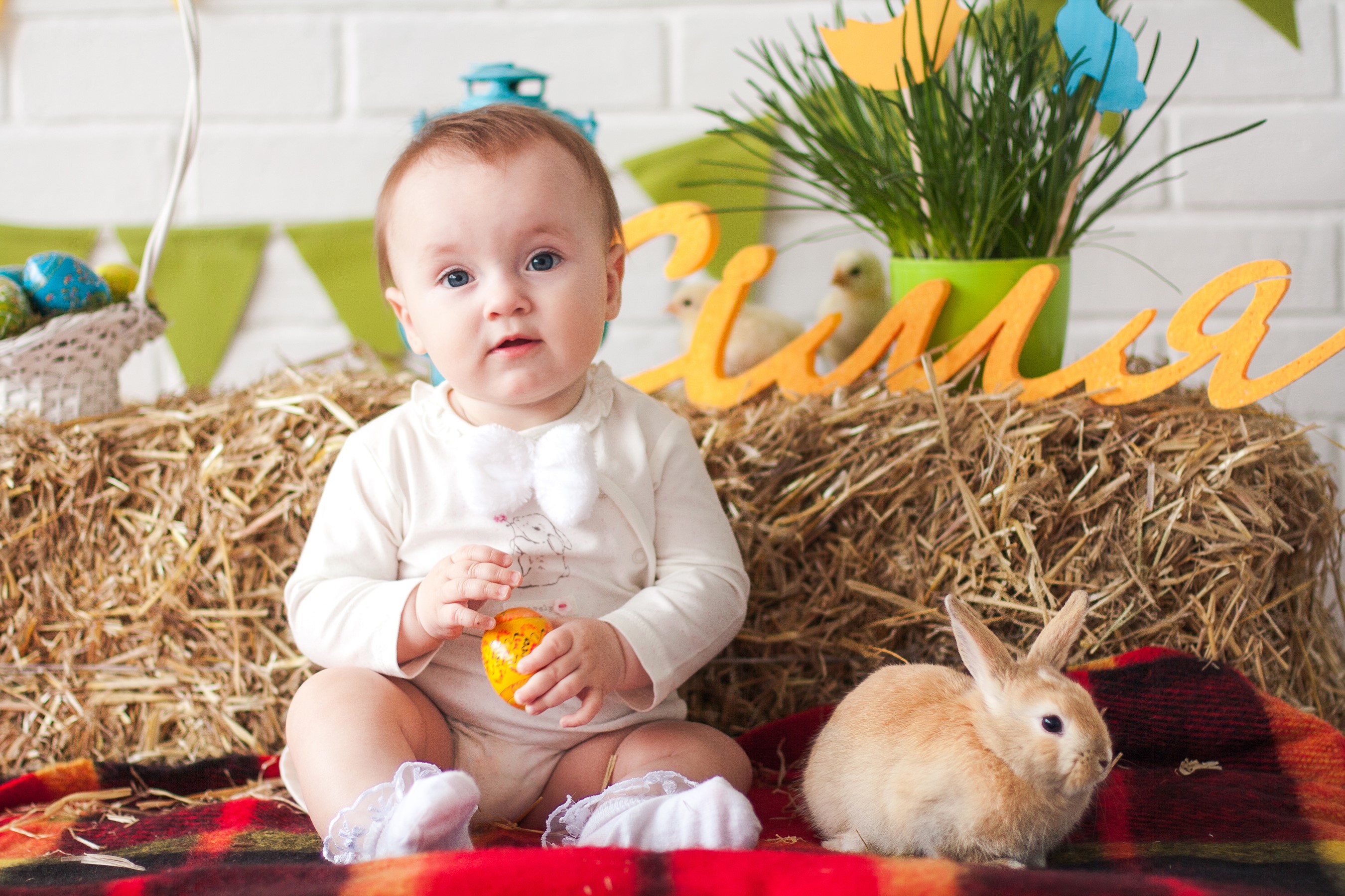 Baby with Easter bunny and eggs HD Wallpaper