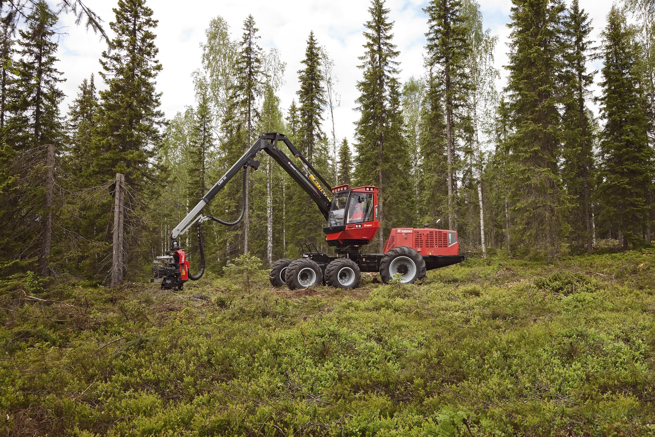 Valmet 901TX Harvester in a Spruce Forest HD Wallpaper
