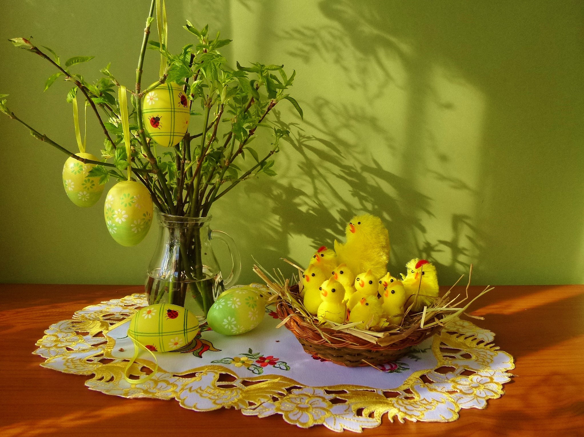 Easter eggs on branches and chicks in a nest HD Wallpaper