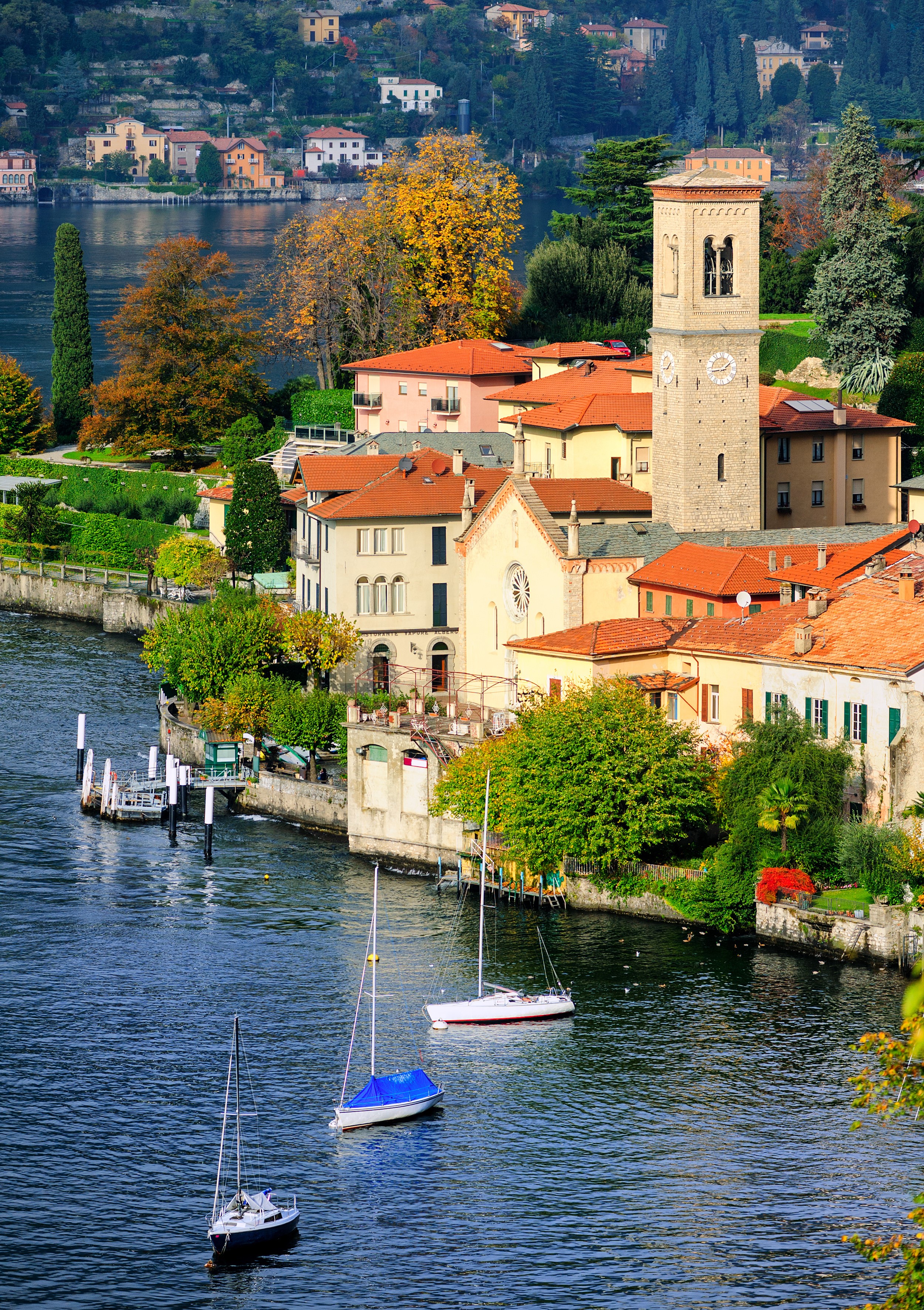 Lake Como, Italy with boats and buildings HD Phone Wallpaper