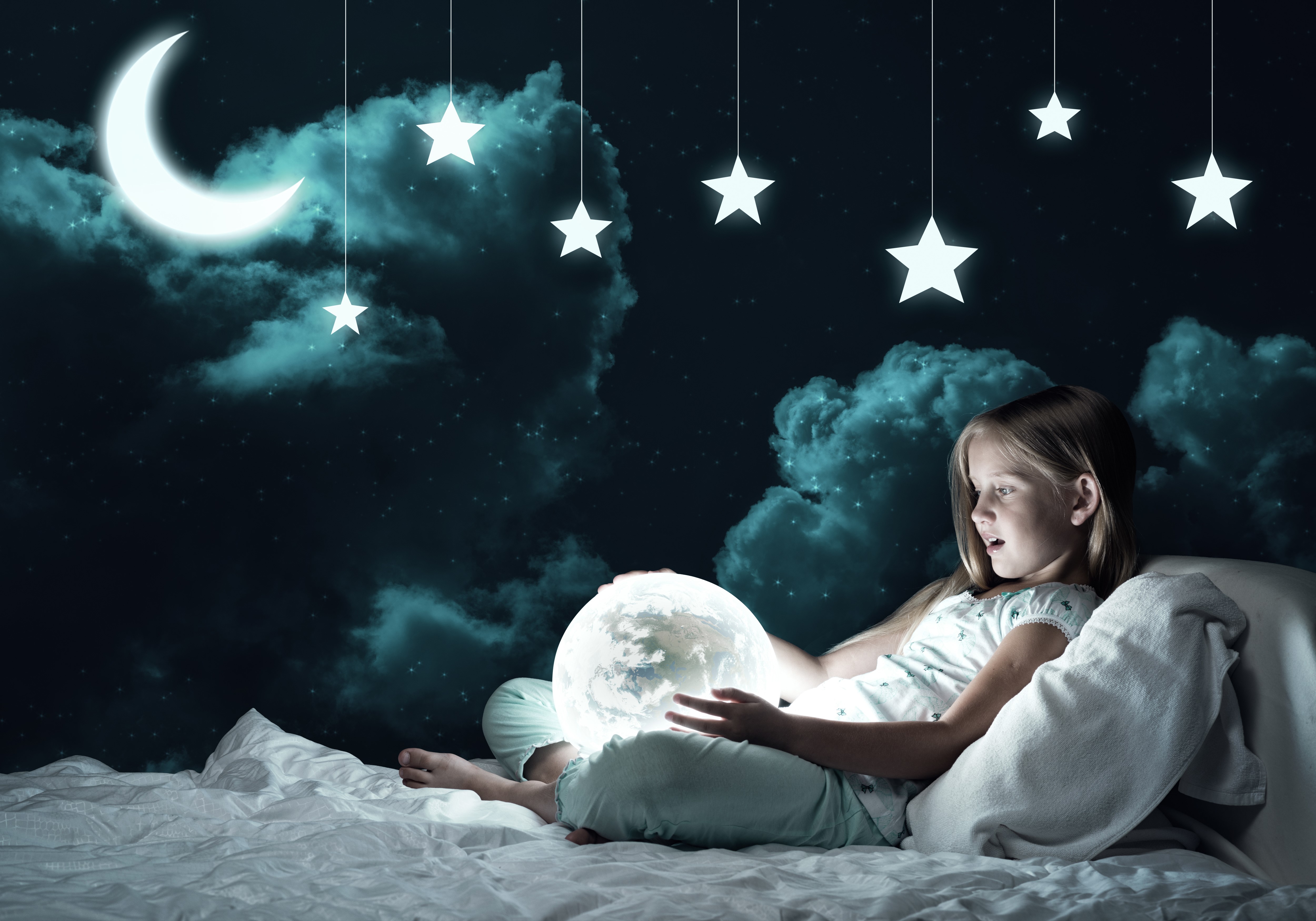 Girl with glowing moon in bed under starry night sky HD Wallpaper