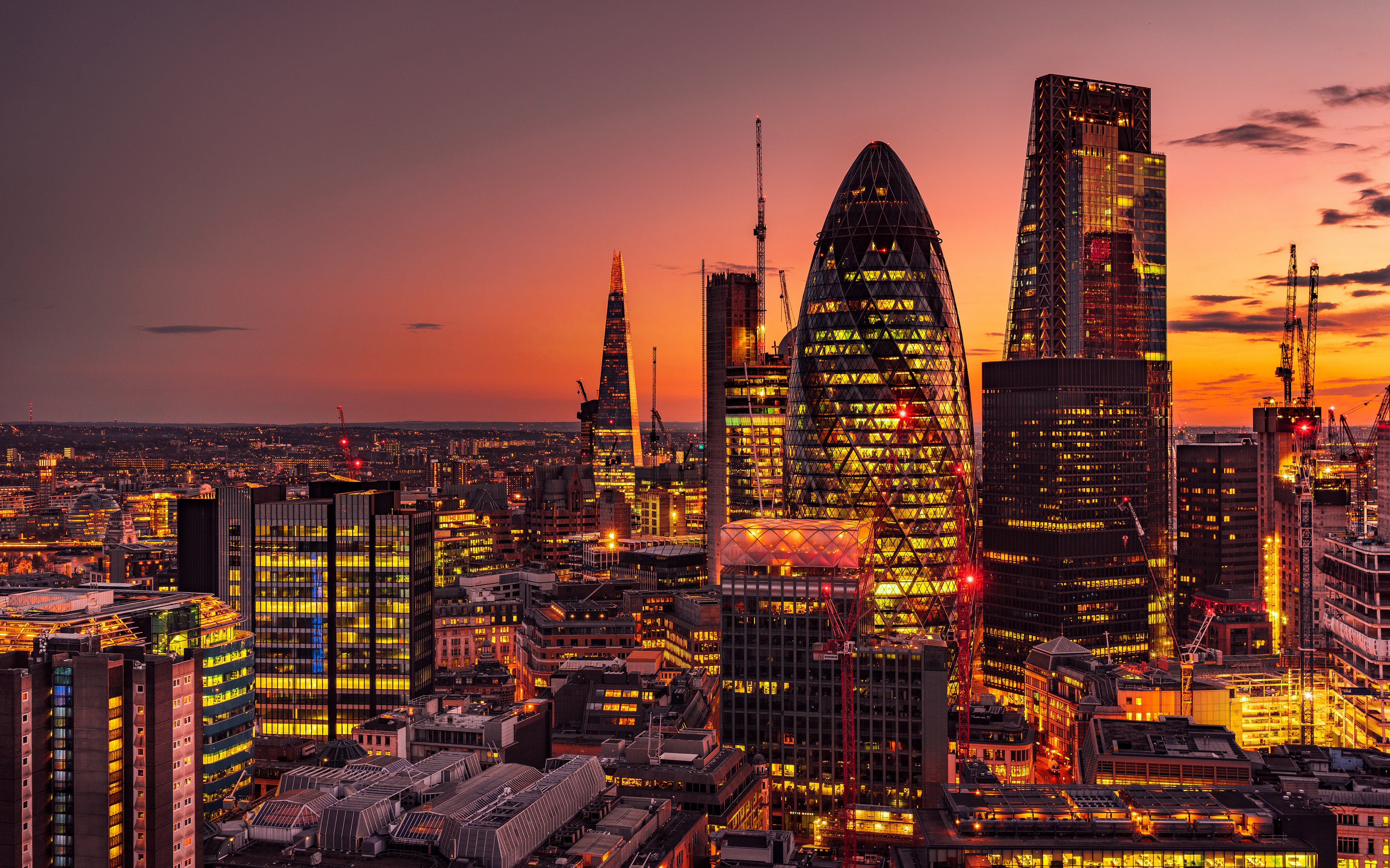 London skyline with Gherkin building at sunset HD Wallpaper