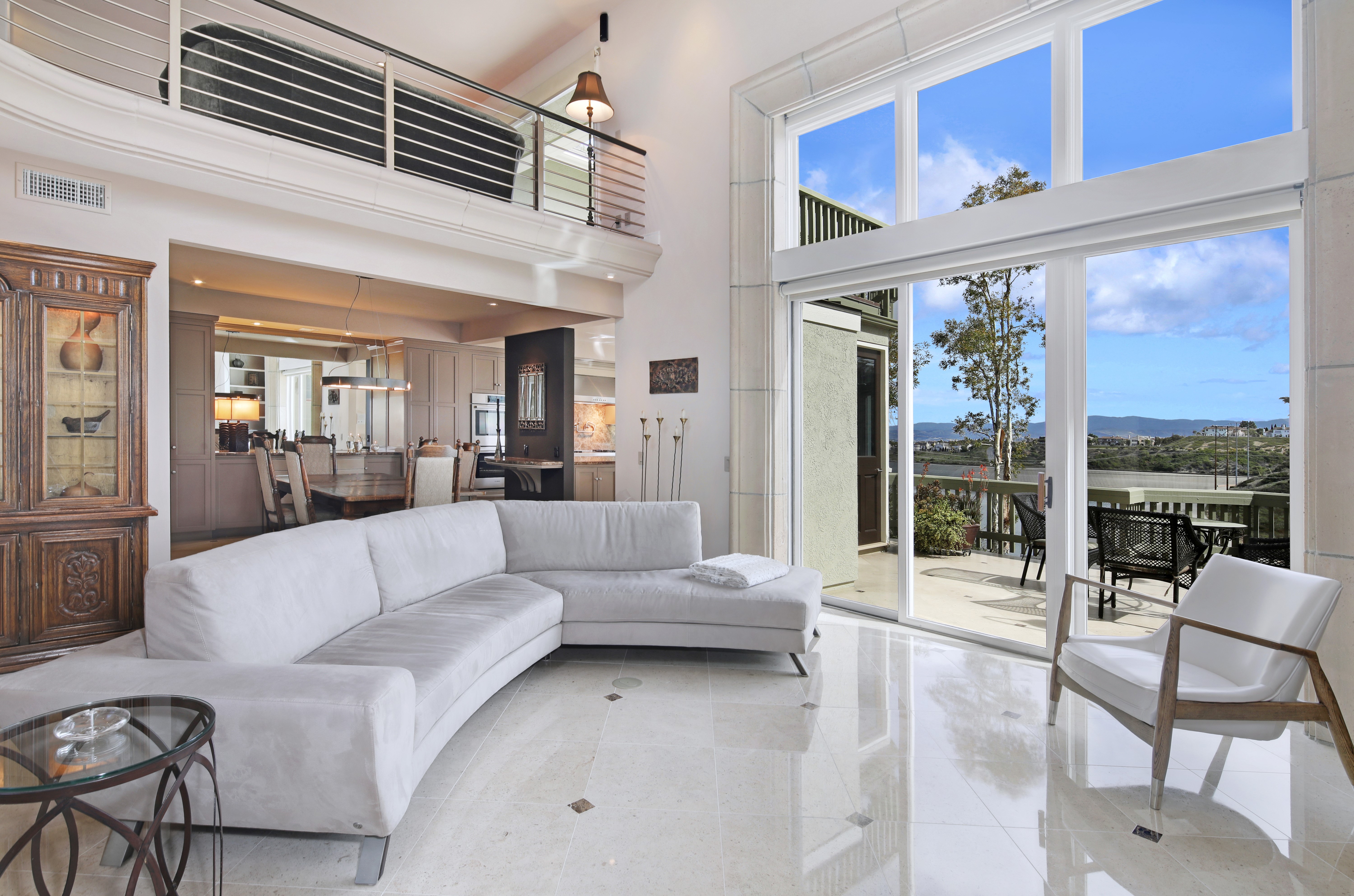 Modern living room with large windows and view HD Wallpaper