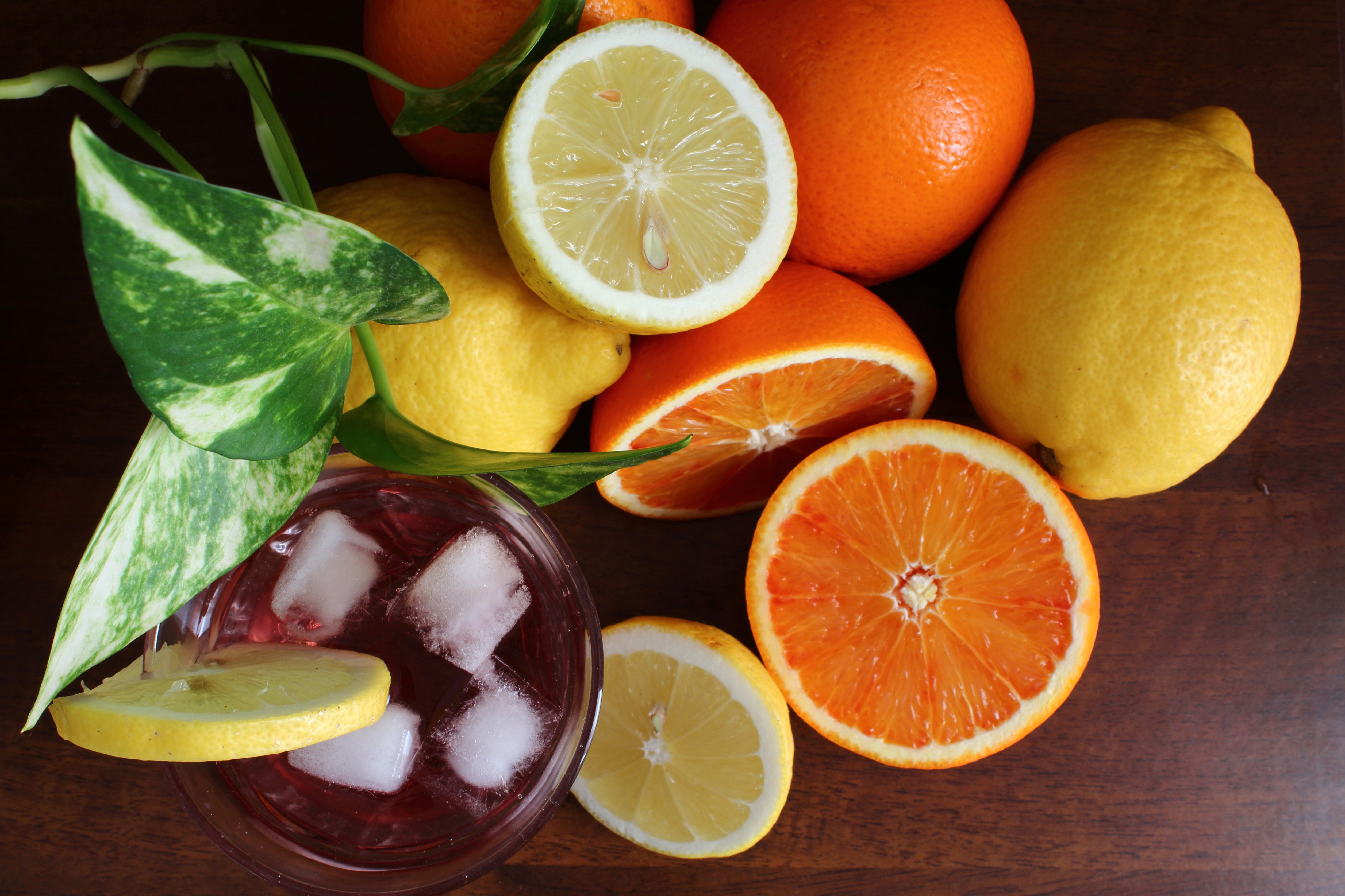 Oranges and Lemons with a Drink and Plant HD Wallpaper