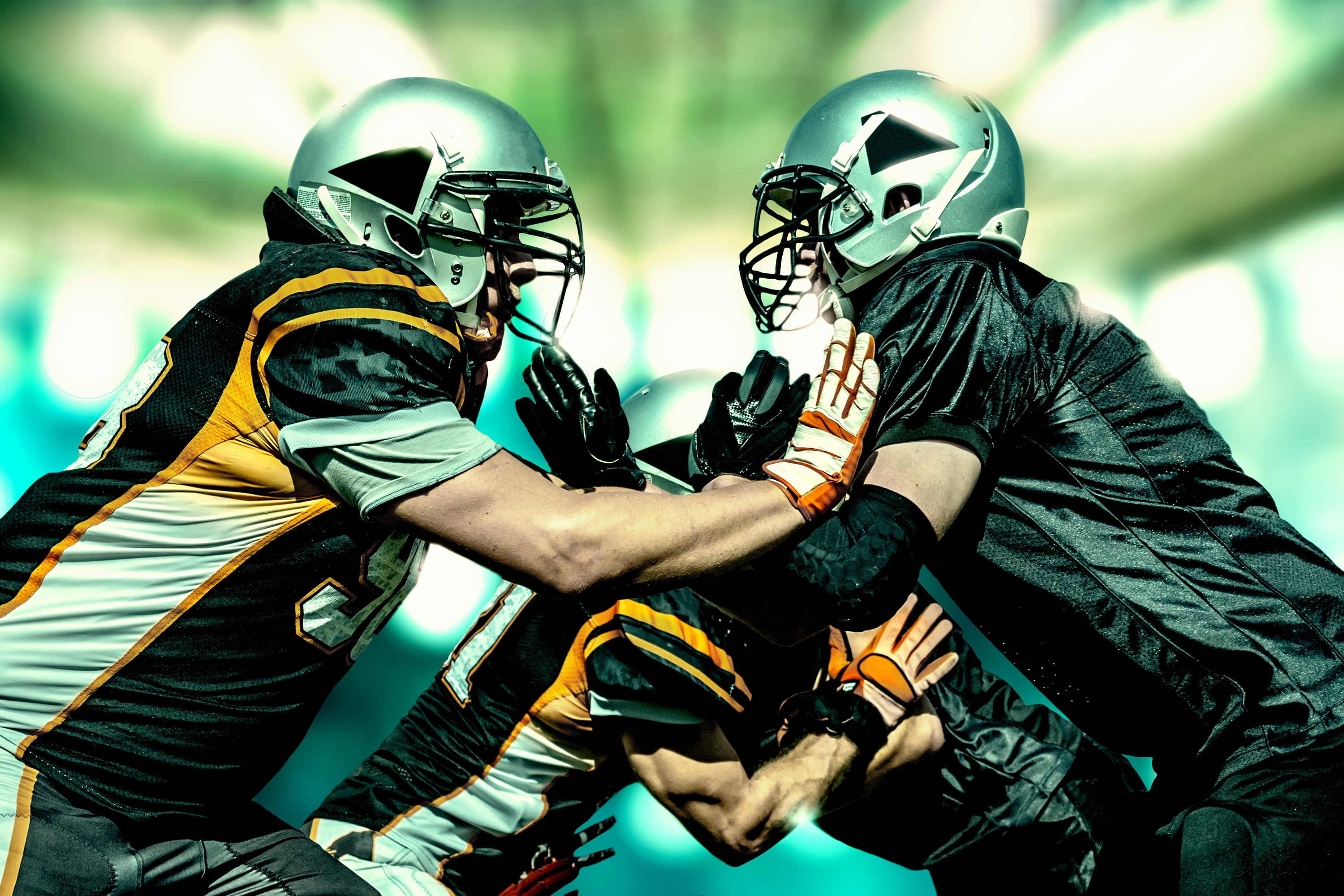 Two American football players in helmets clashing HD Wallpaper