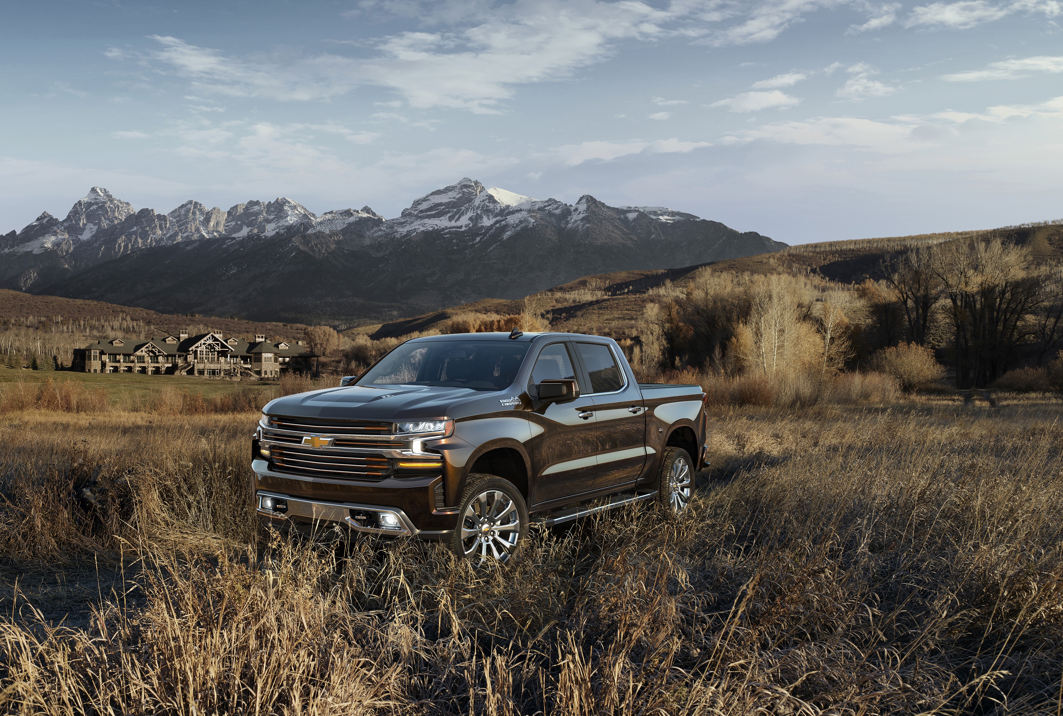 2019 Chevrolet Silverado High Country Crew Cab in a field HD Wallpaper