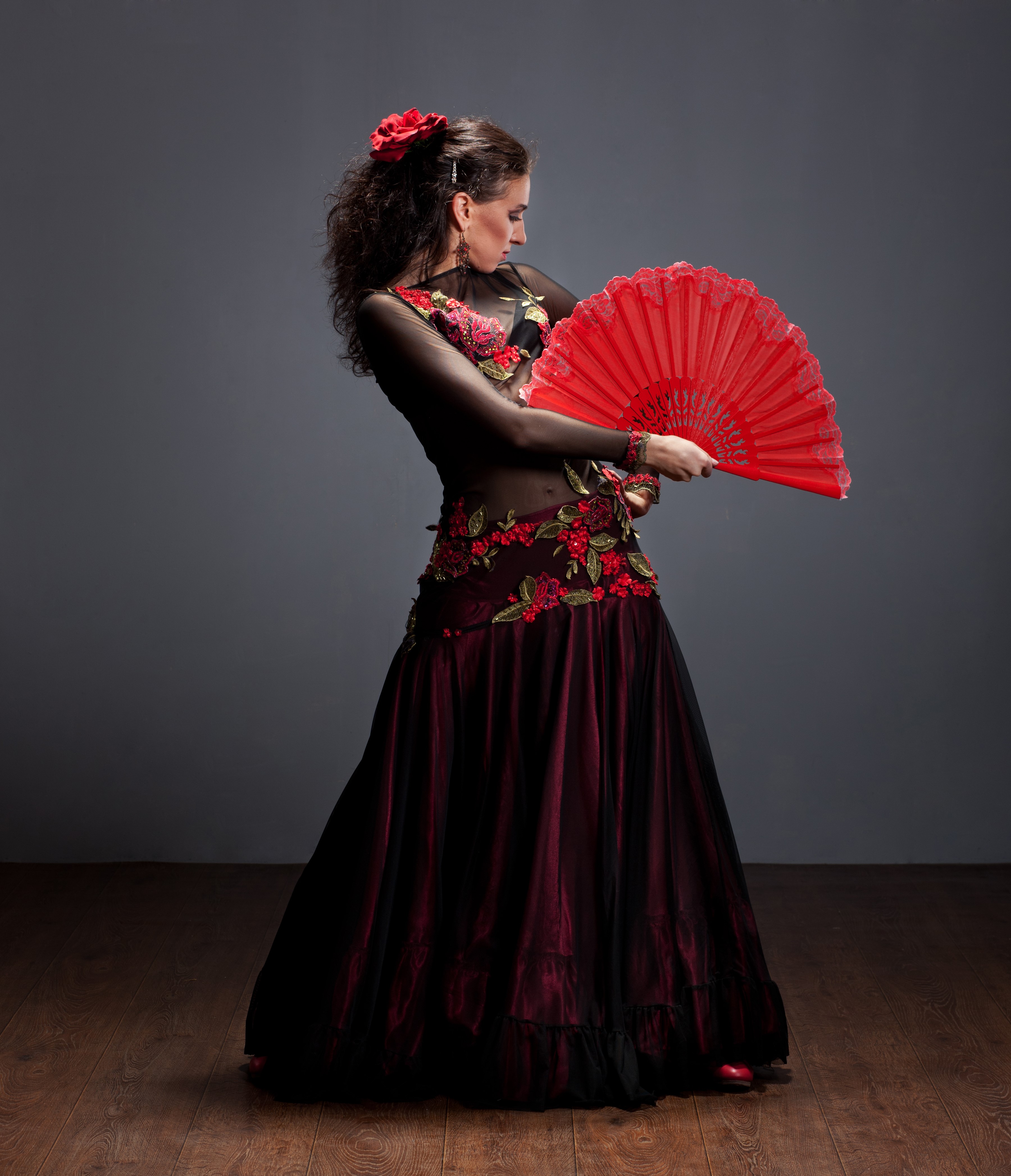 Flamenco dancer with red fan HD Wallpaper