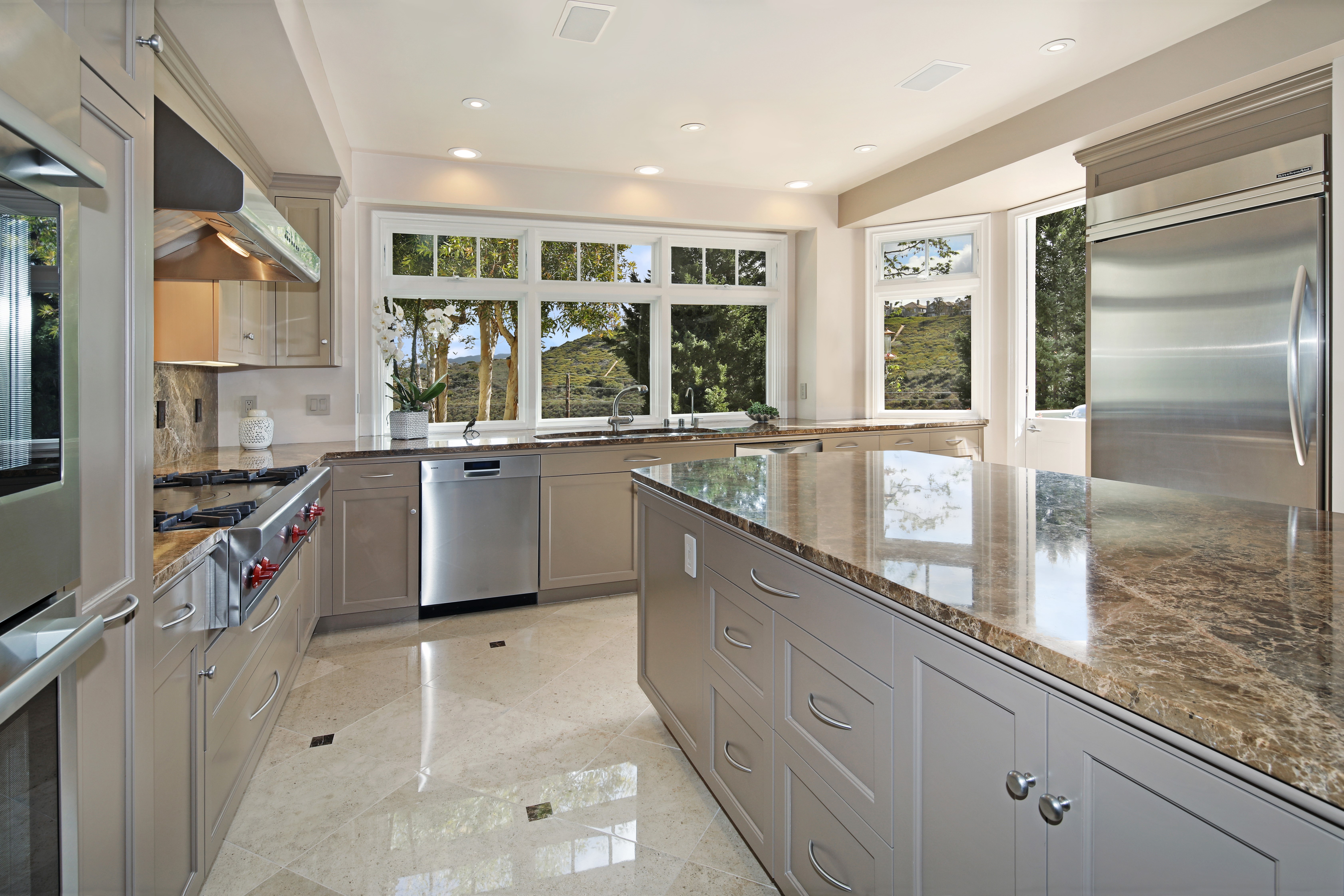 Kitchen Interior Design with Island and Stainless Steel Appliances HD Wallpaper