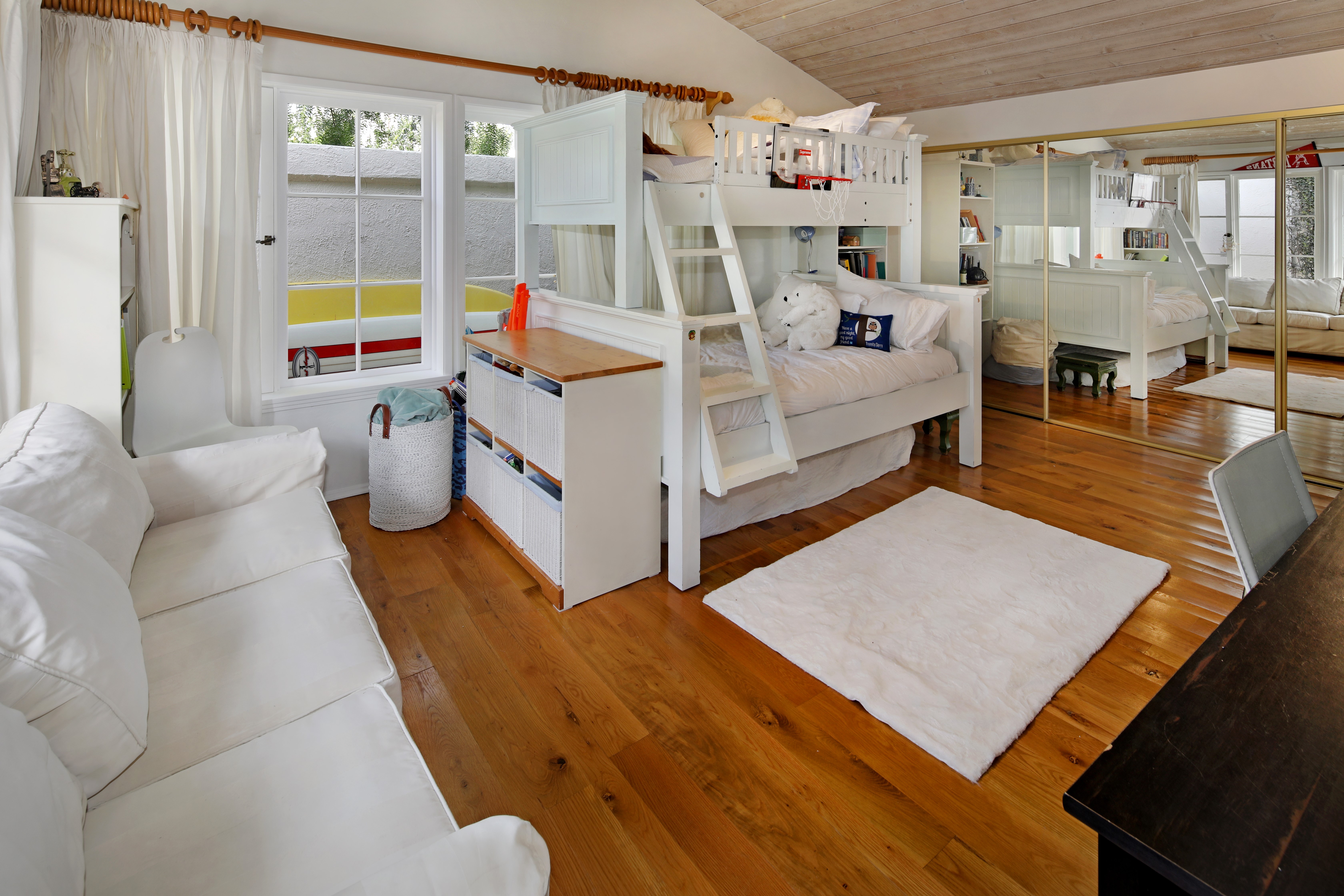 Children's room with bunk bed and sofa HD Wallpaper