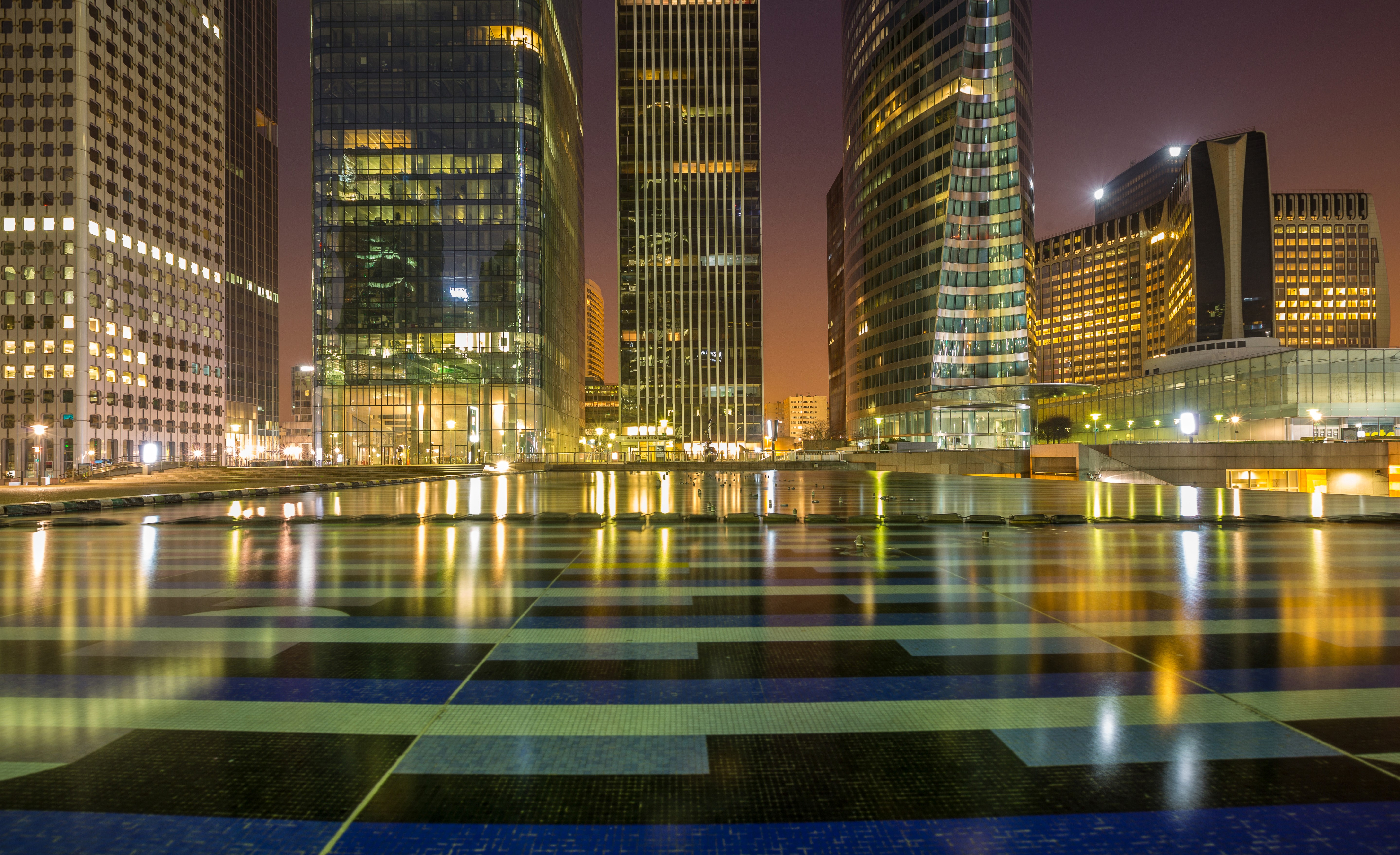 Modern skyscrapers and reflections at night in Paris HD Wallpaper
