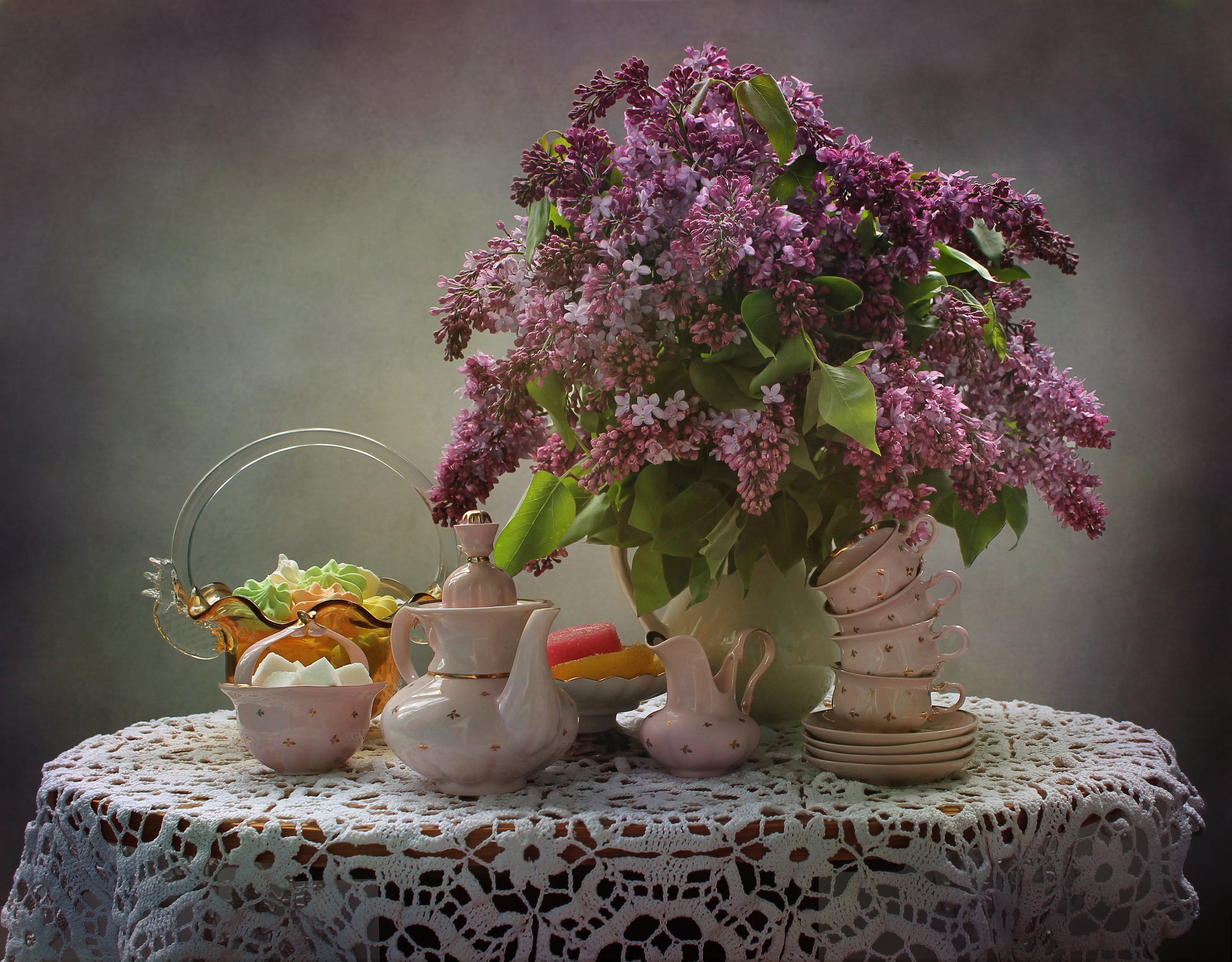 Still-life with lilac bouquet, tea set, and sweets HD Wallpaper