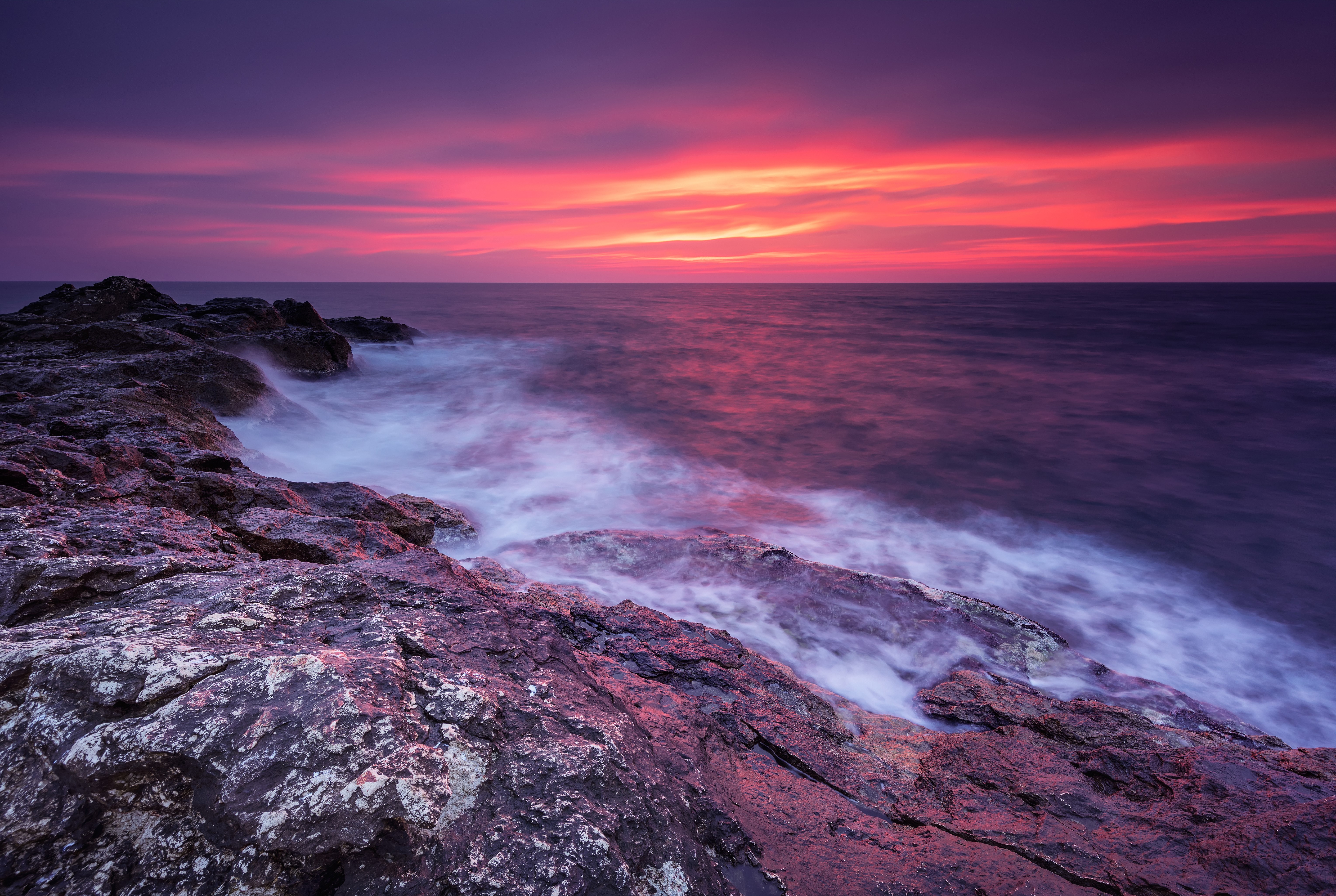Sunset over rocky coast with waves in Bulgaria HD Wallpaper