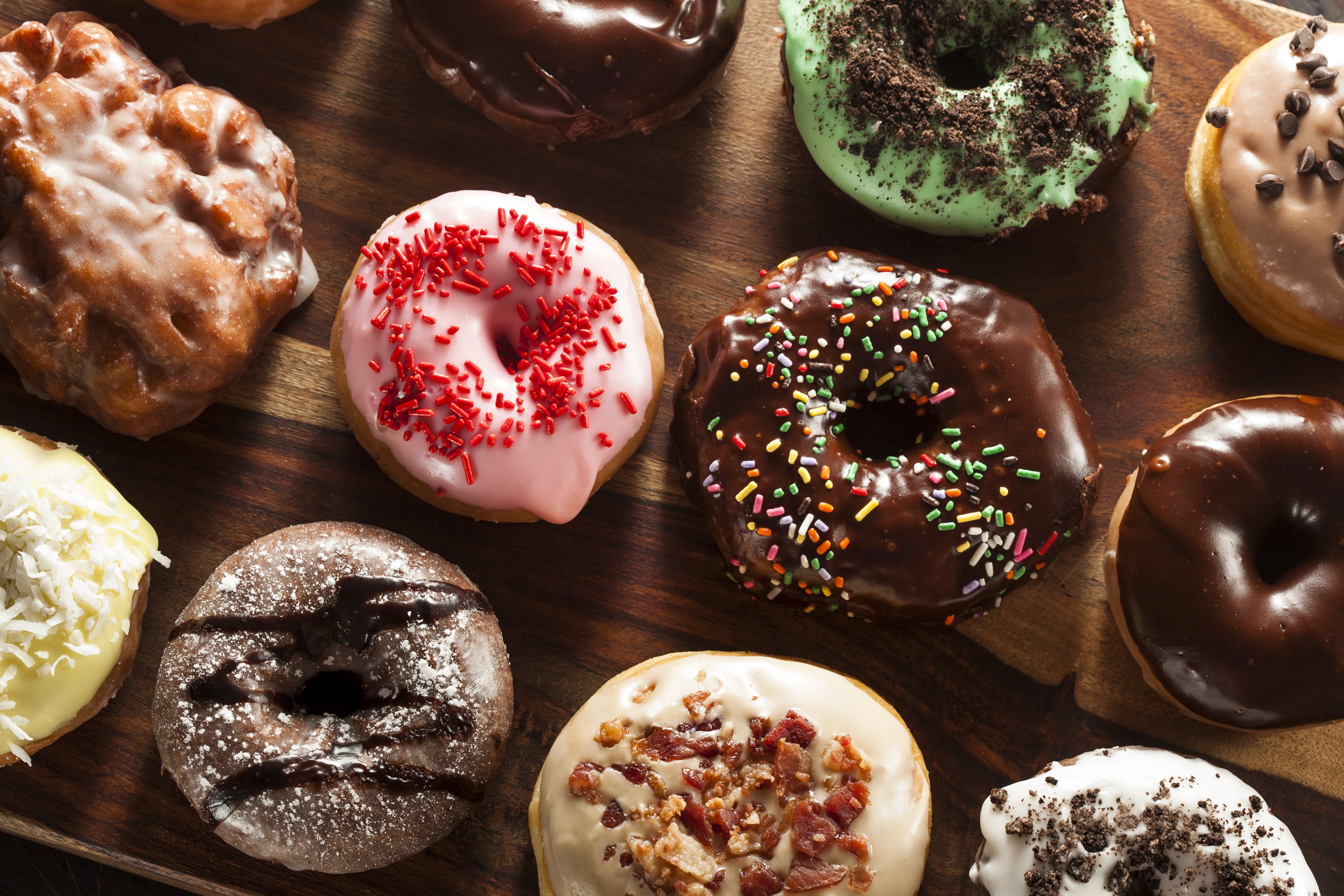 Assorted Donuts on a Wooden Board HD Wallpaper