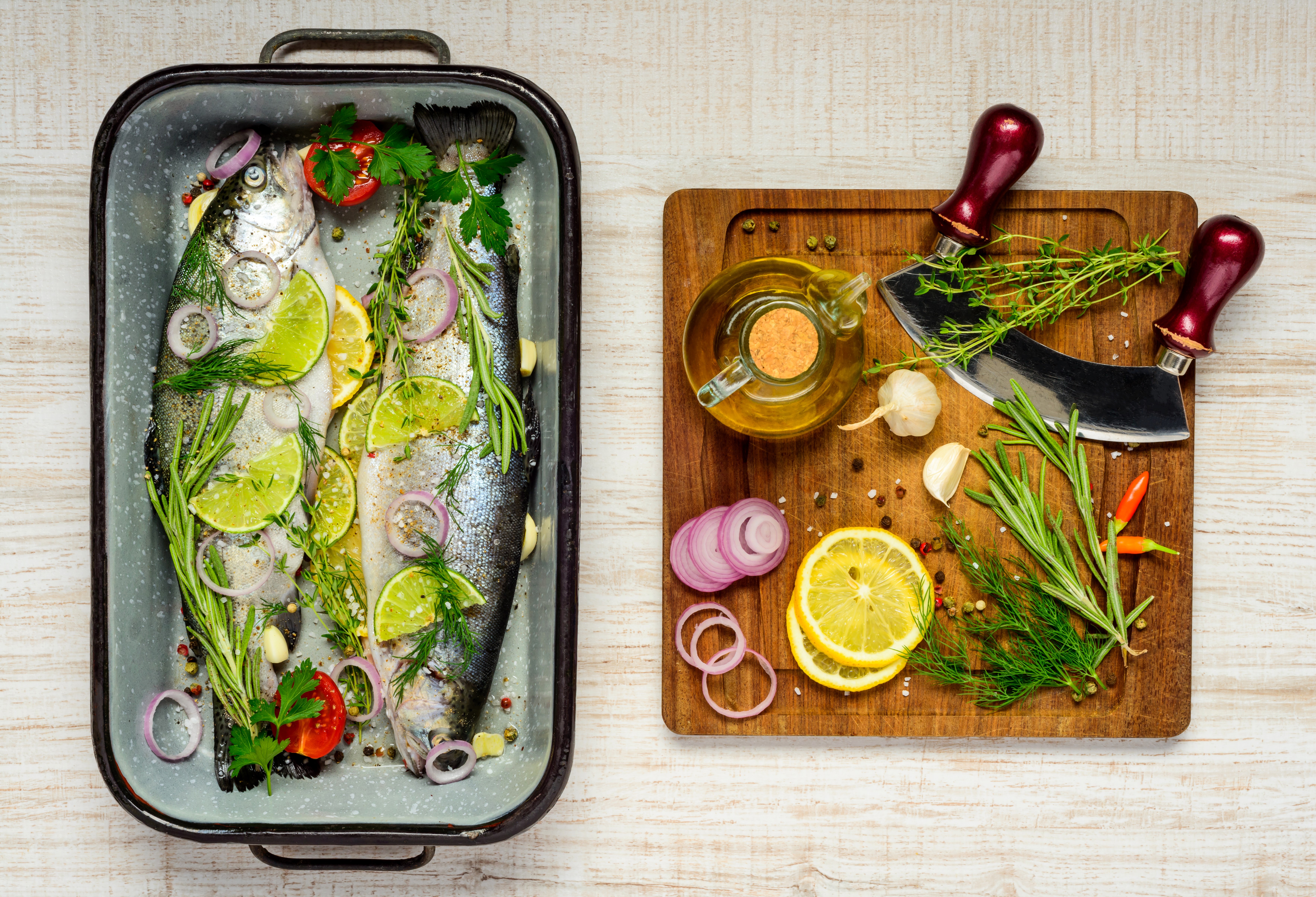 Fish with Lemons, Herbs, and Spices on Cutting Board HD Wallpaper