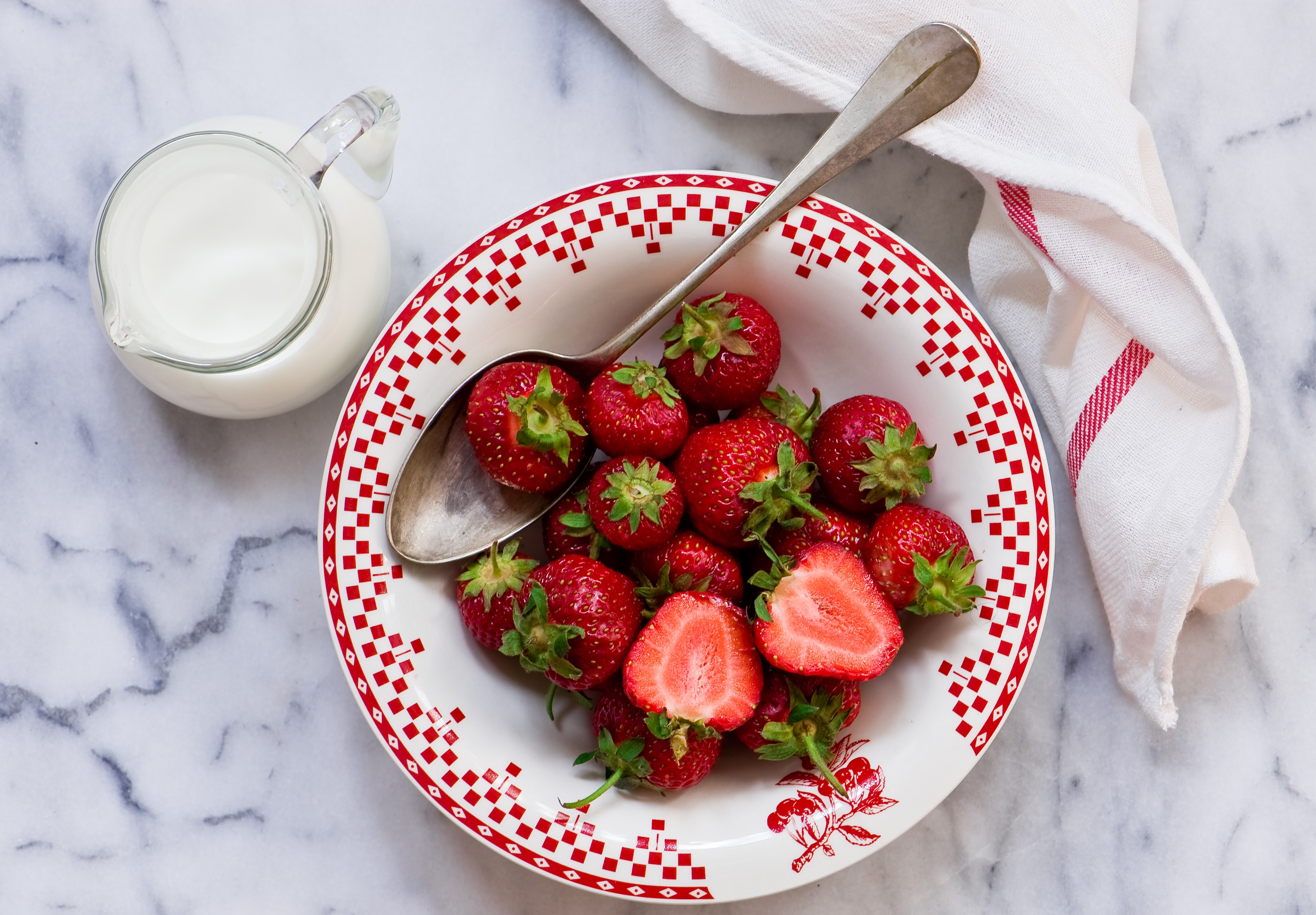Strawberries and Milk in a Bowl with Spoon HD Wallpaper