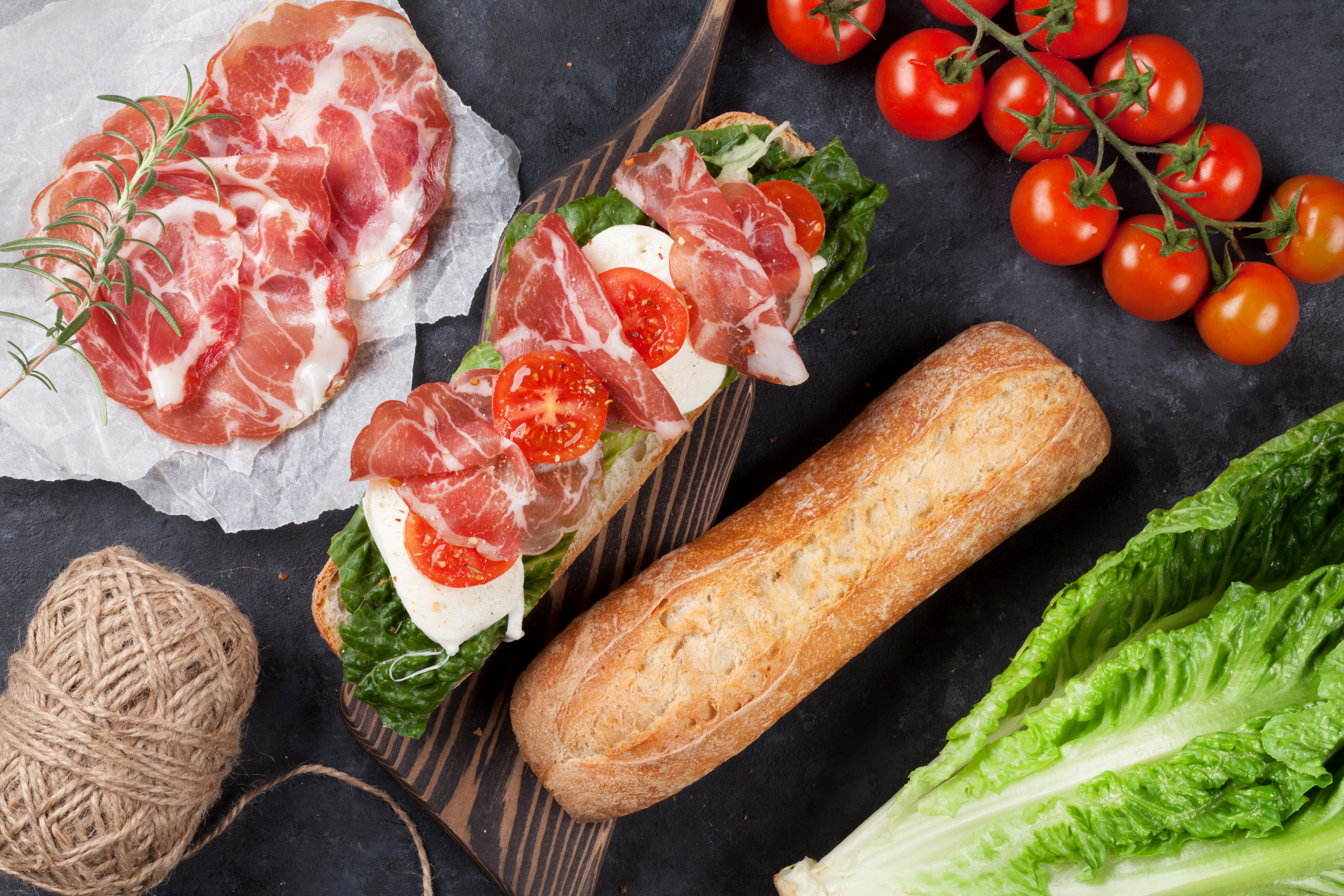 Sandwich with ham, mozzarella, tomatoes, lettuce, and baguette HD Wallpaper