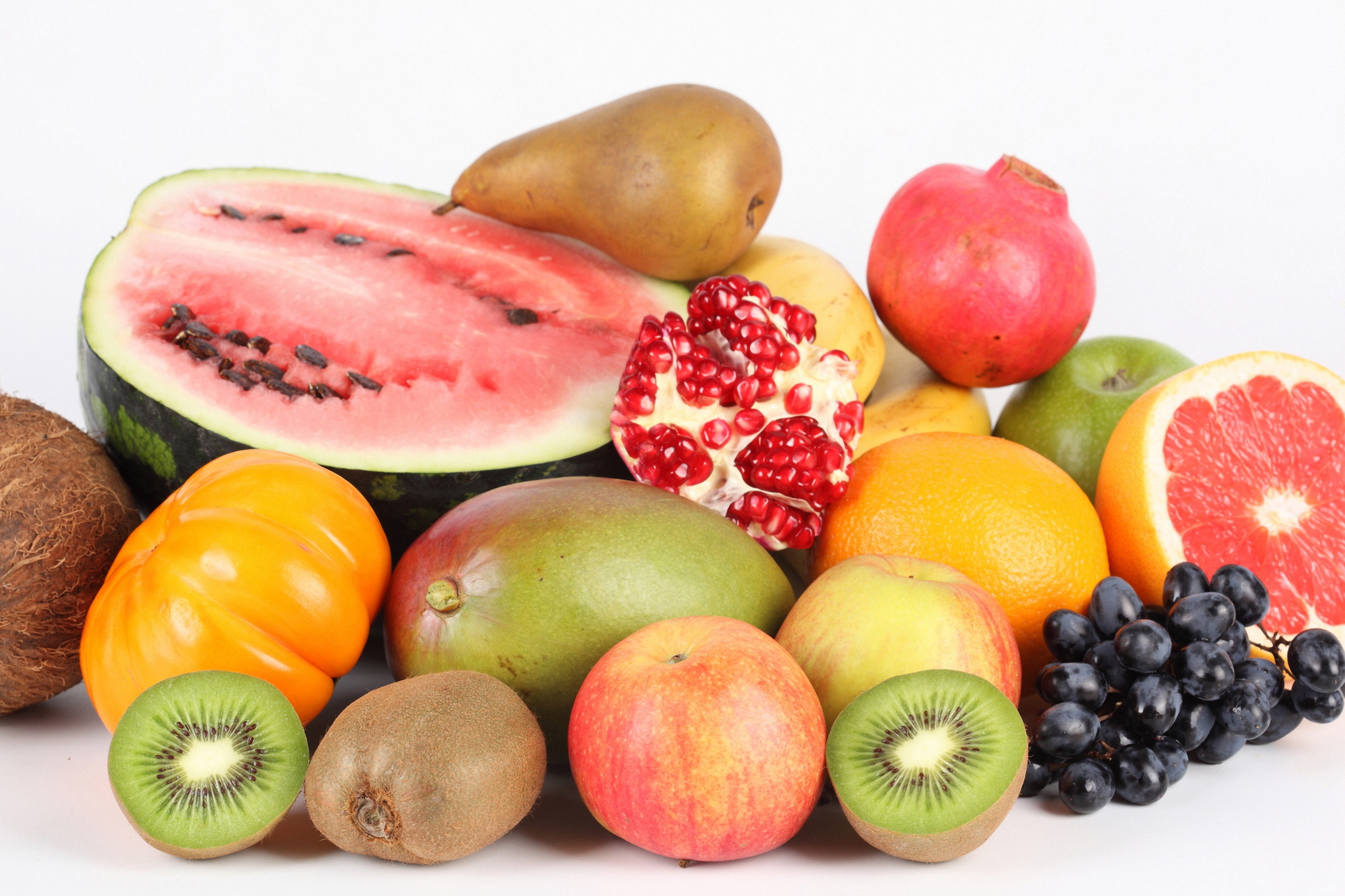 Assortment of fresh fruits including watermelon, kiwi, and grapes HD Wallpaper
