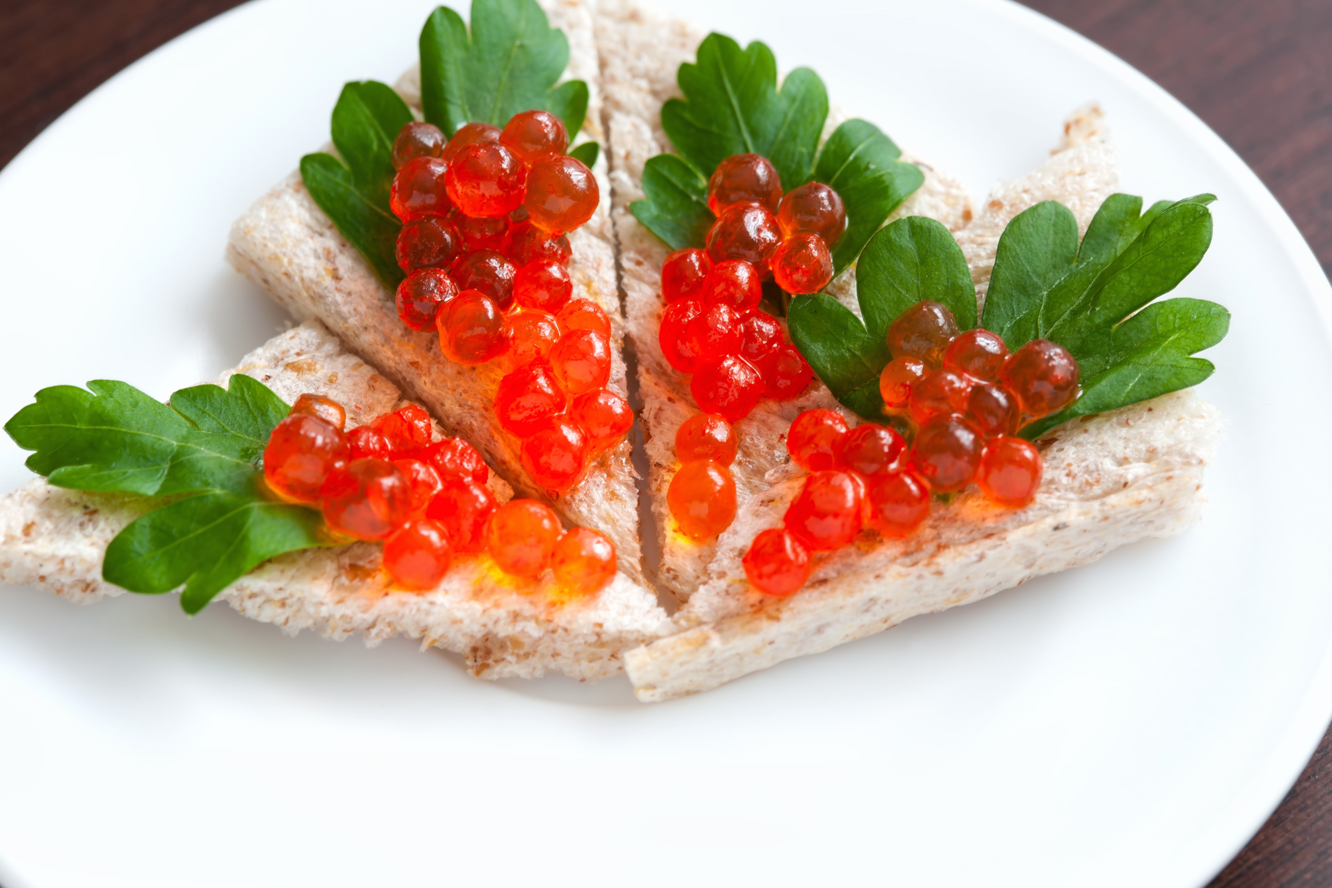 Caviar on toast with parsley HD Wallpaper