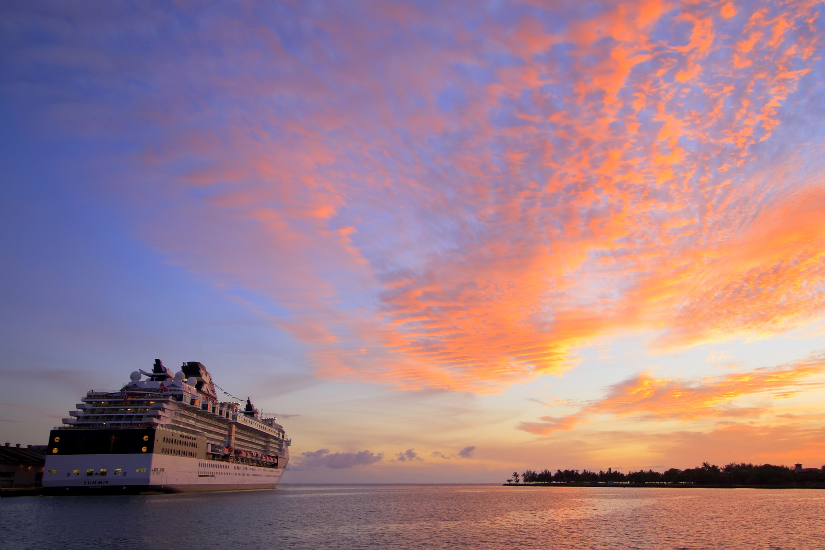Cruise liner docked at sunset with colorful clouds HD Wallpaper