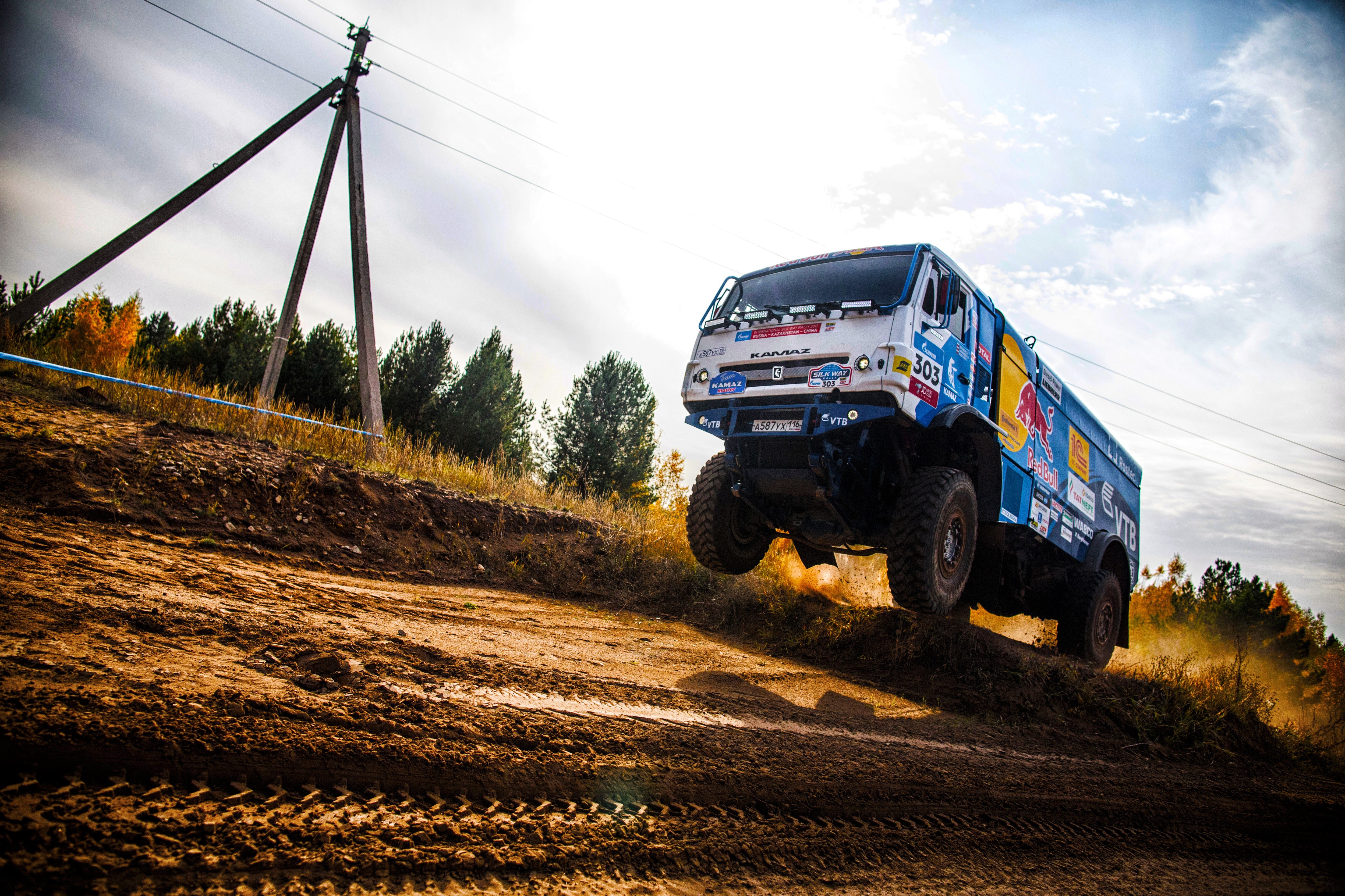 KAMAZ 303 Rally Truck Jumping Dirt Hill HD Wallpaper