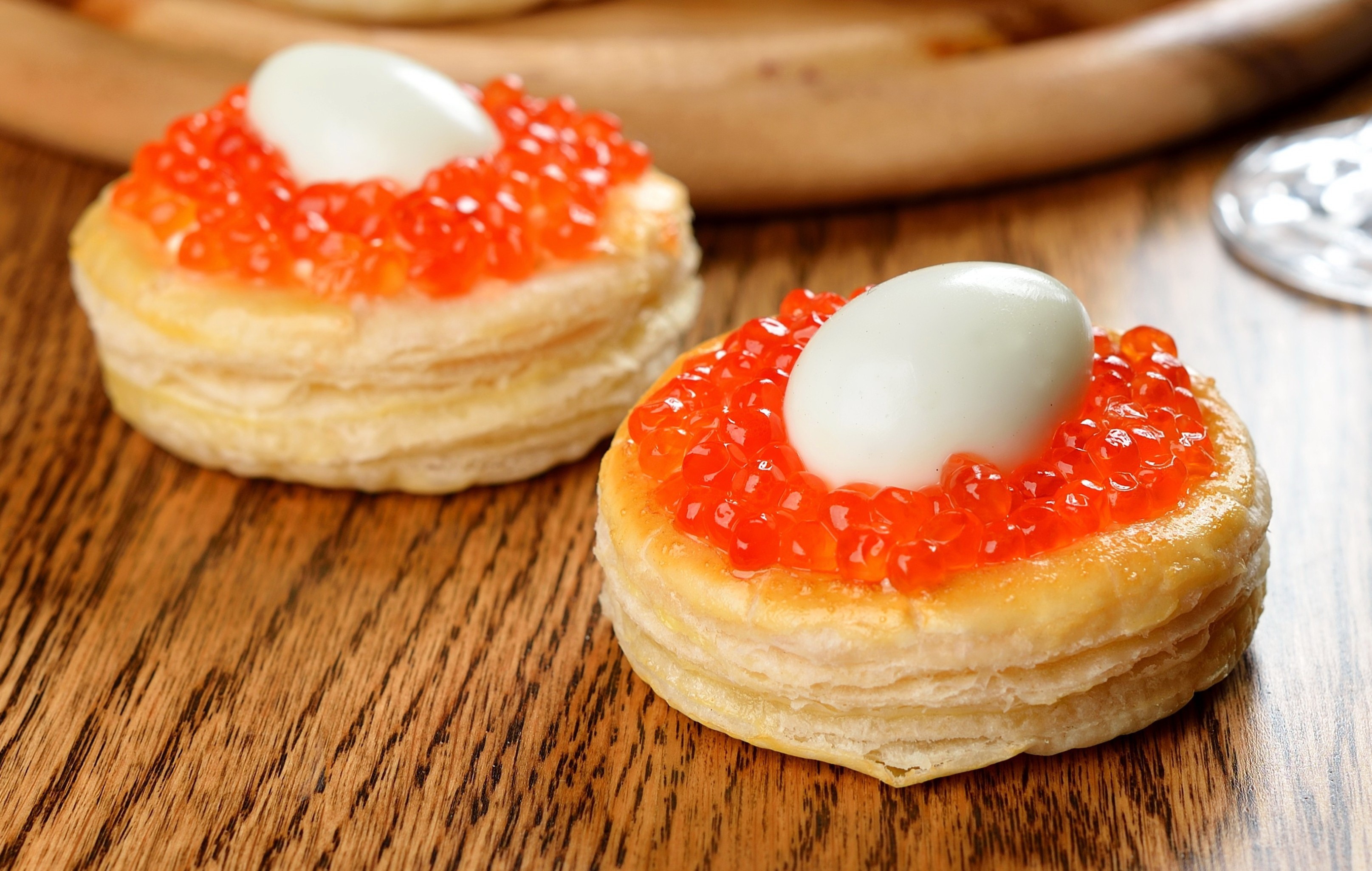 Two vol-au-vents with red caviar and quail eggs HD Wallpaper