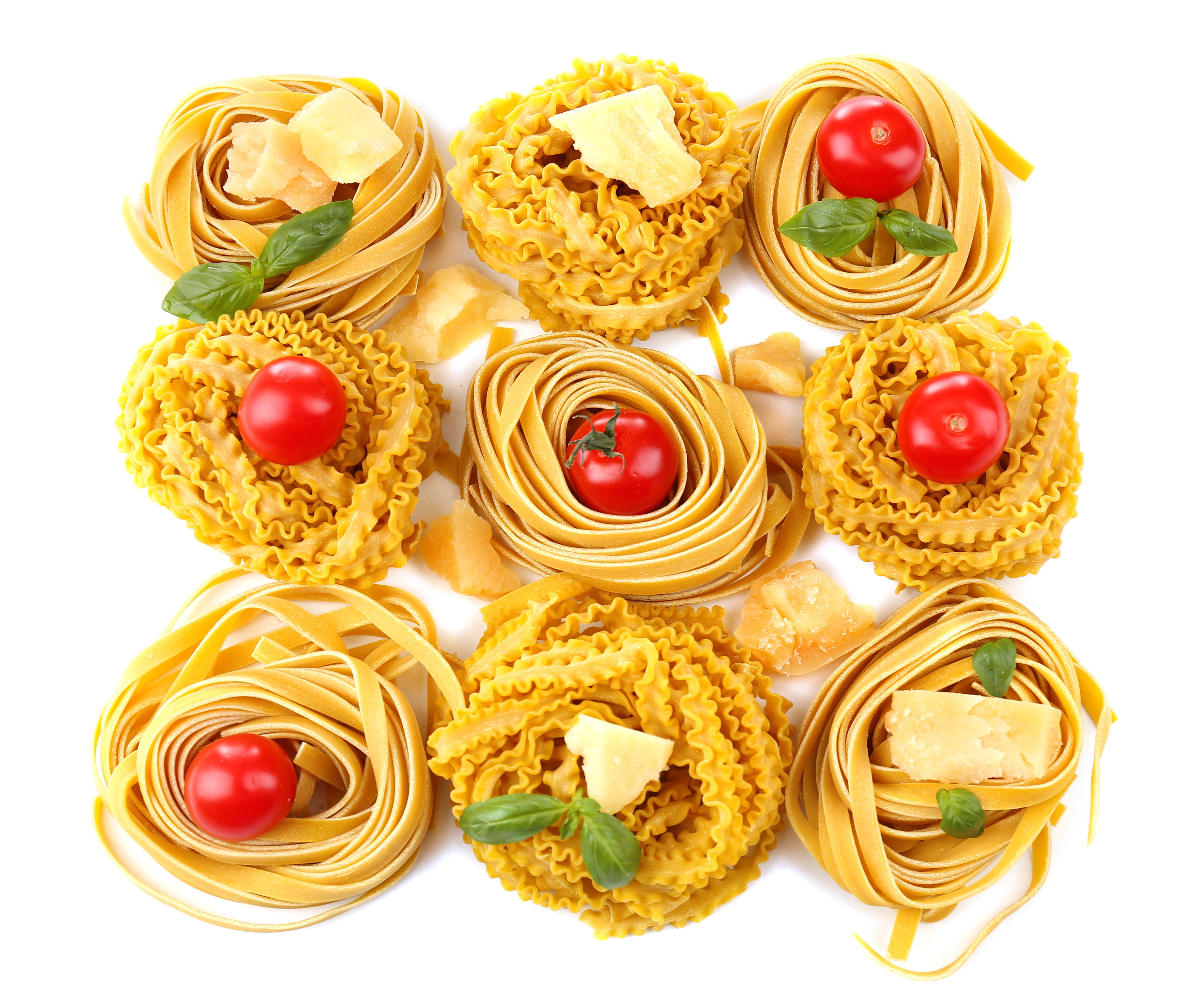 Pasta nests with tomatoes, cheese, and basil on white background HD Wallpaper