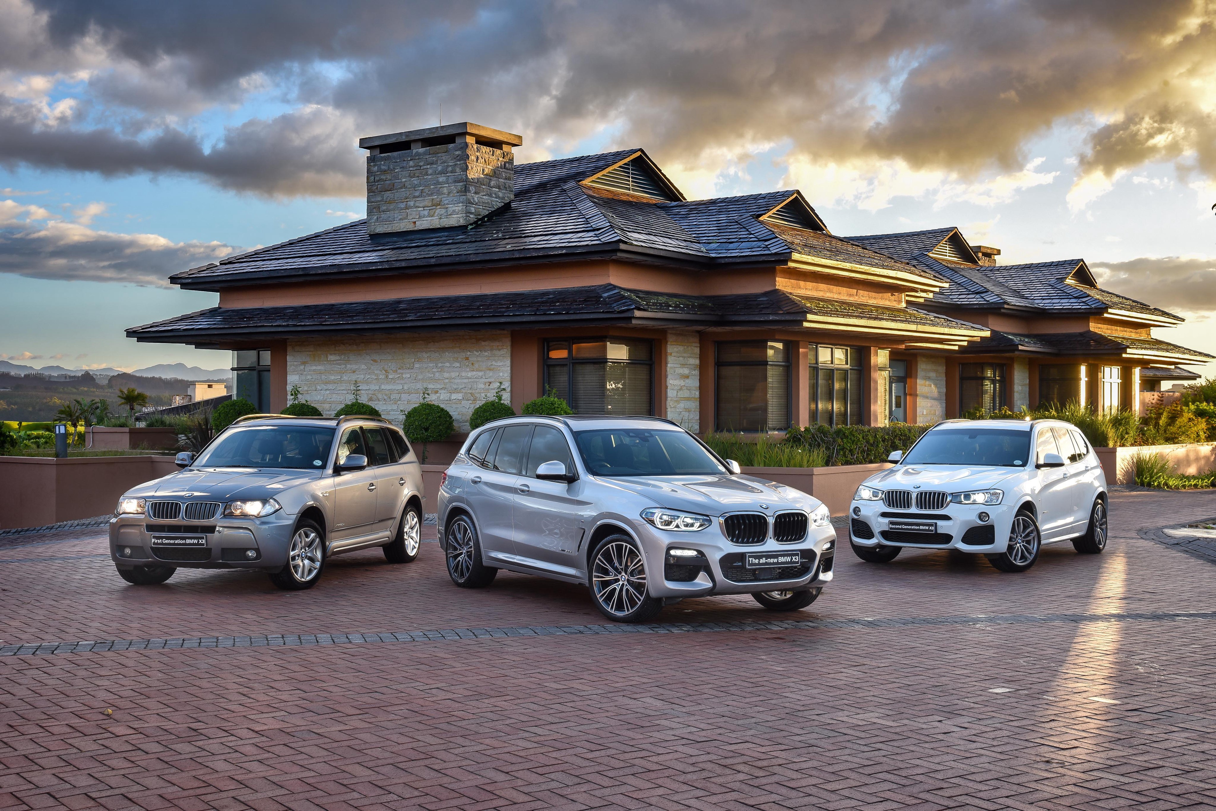 Three BMW X3 cars in front of a house HD Wallpaper