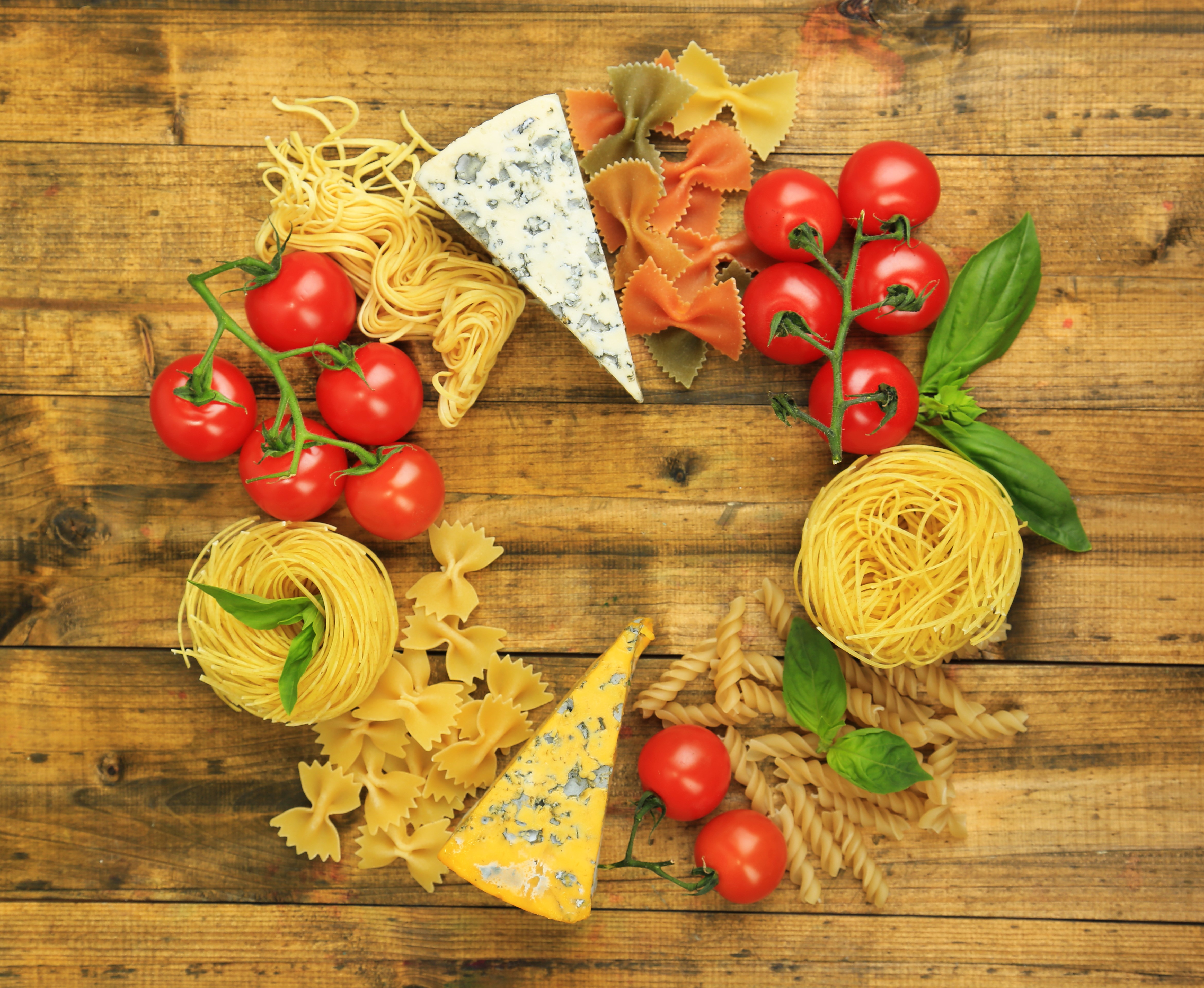 4K Tomatoes, Cheese, and Pasta on Wood HD Wallpaper